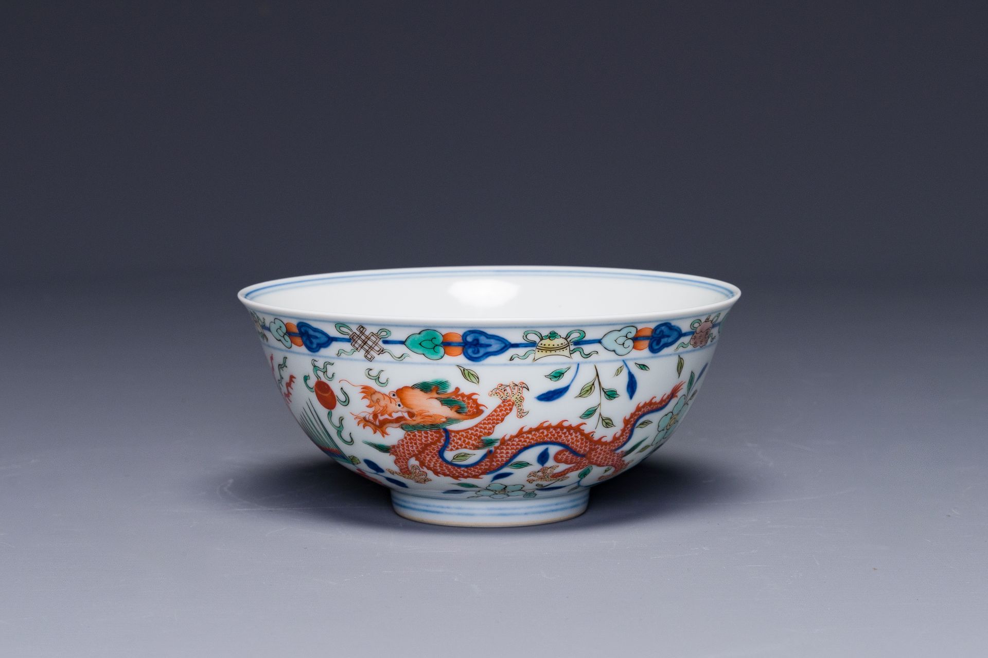 A Chinese wucai 'dragon and phoenix' bowl, Daoguang mark and of the period - Image 2 of 4