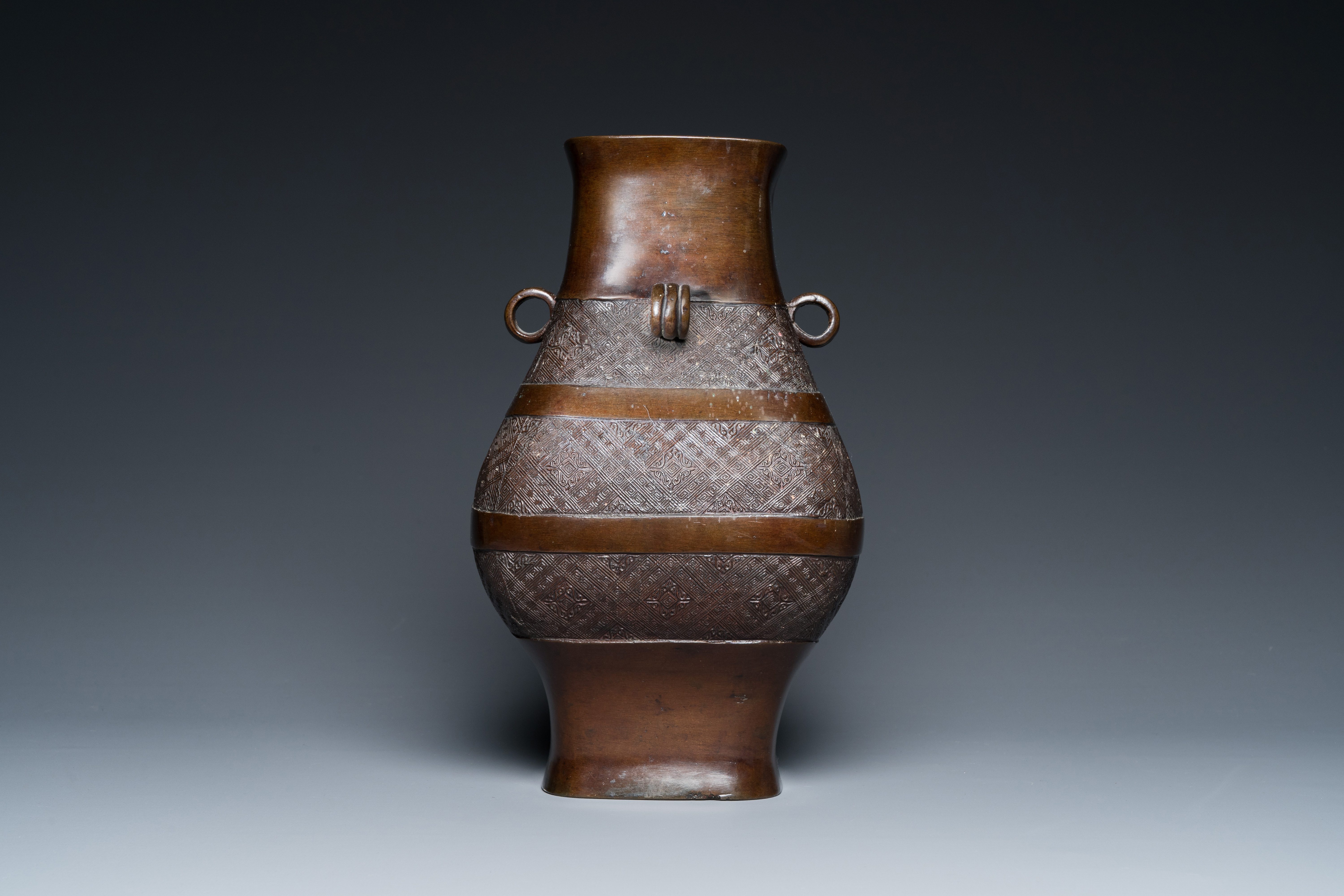 A Chinese archaistic bronze 'fanghu' vase, Ming - Image 13 of 24