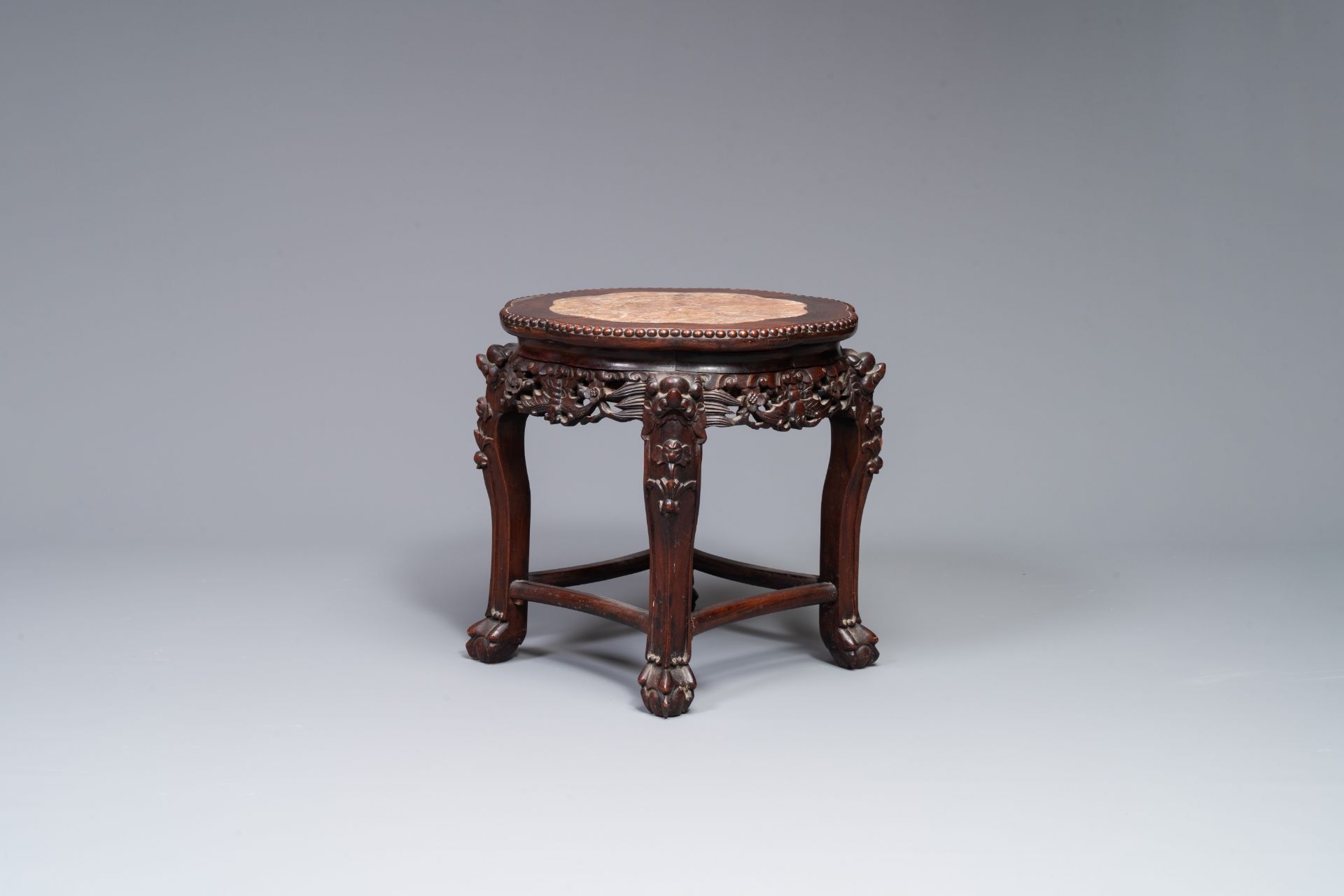 A Chinese carved wooden stand and a low table with marble tops, 19th C. - Image 8 of 10