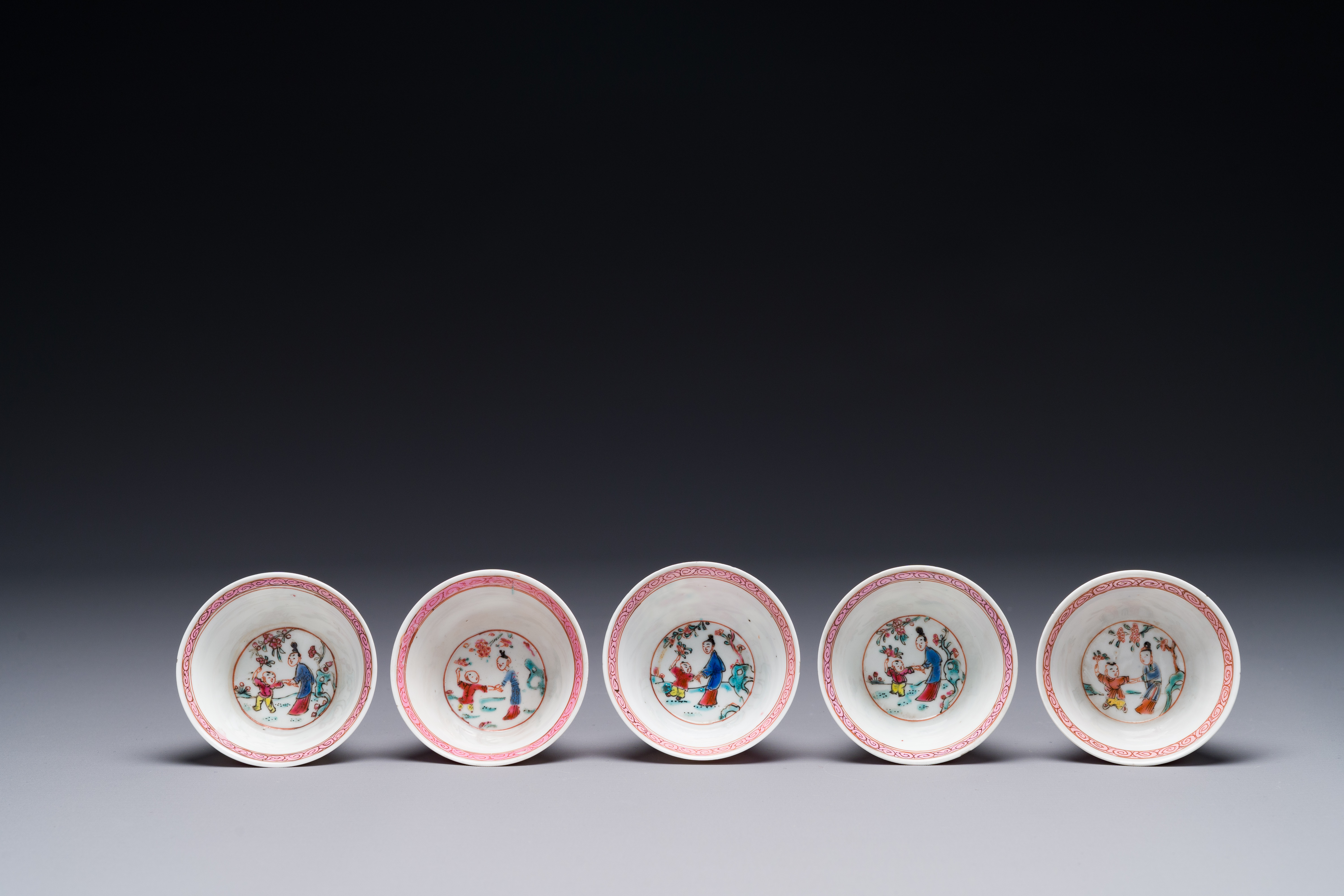 Five Chinese famille rose cups and saucers with figures, Yongzheng - Image 5 of 8