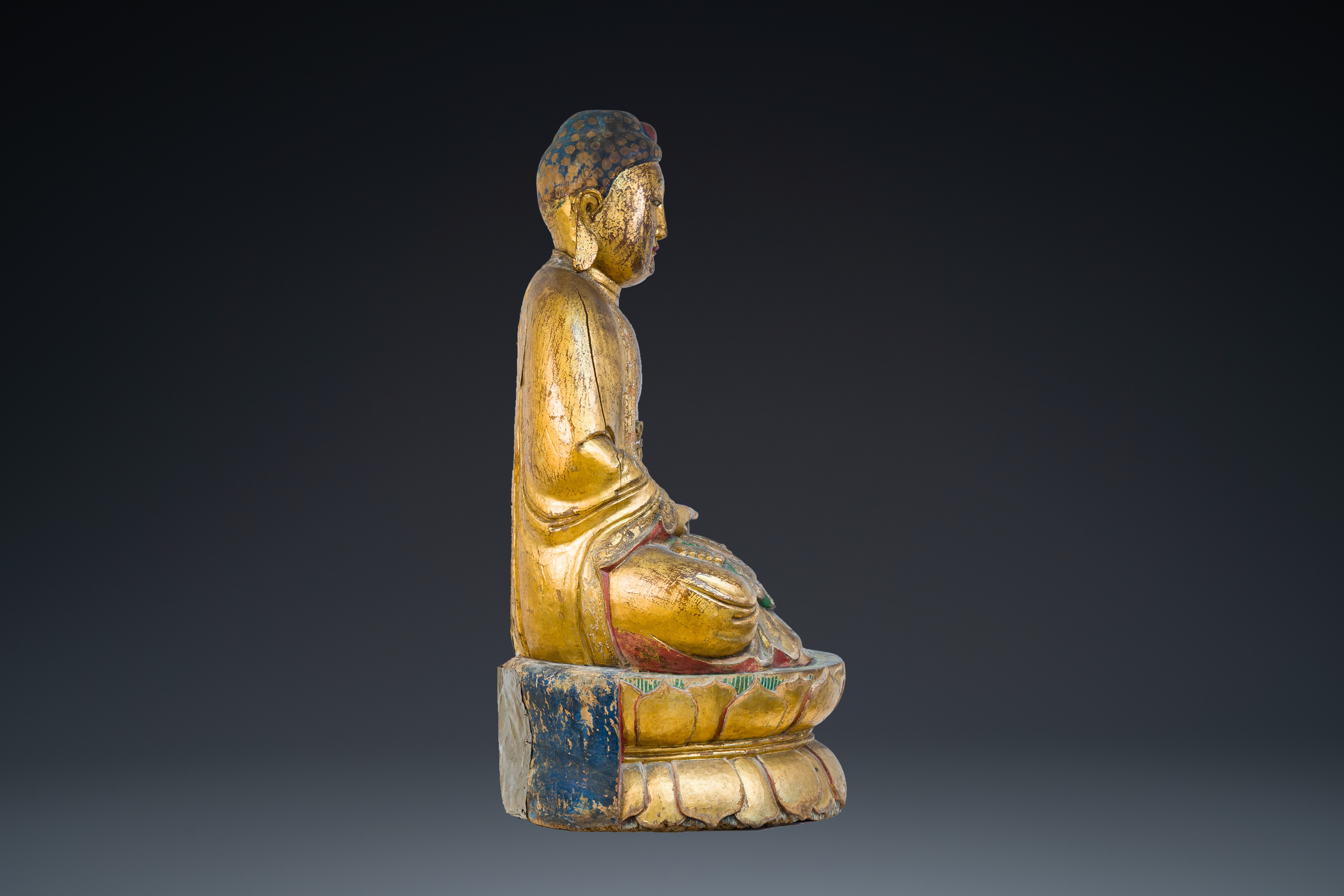 A large Chinese or Vietnamese gilded and polychromed wooden Buddha, 19th C. - Image 2 of 9