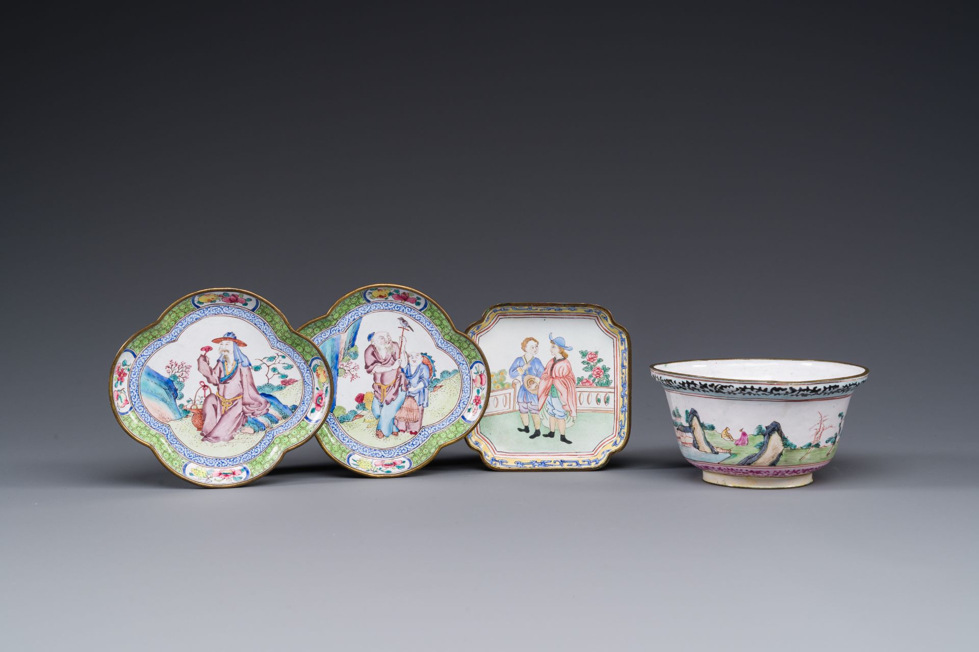 Three Chinese Canton enamel saucers and a bowl, Shangxin èµå¿ƒ mark, Yongzheng/Qianlong