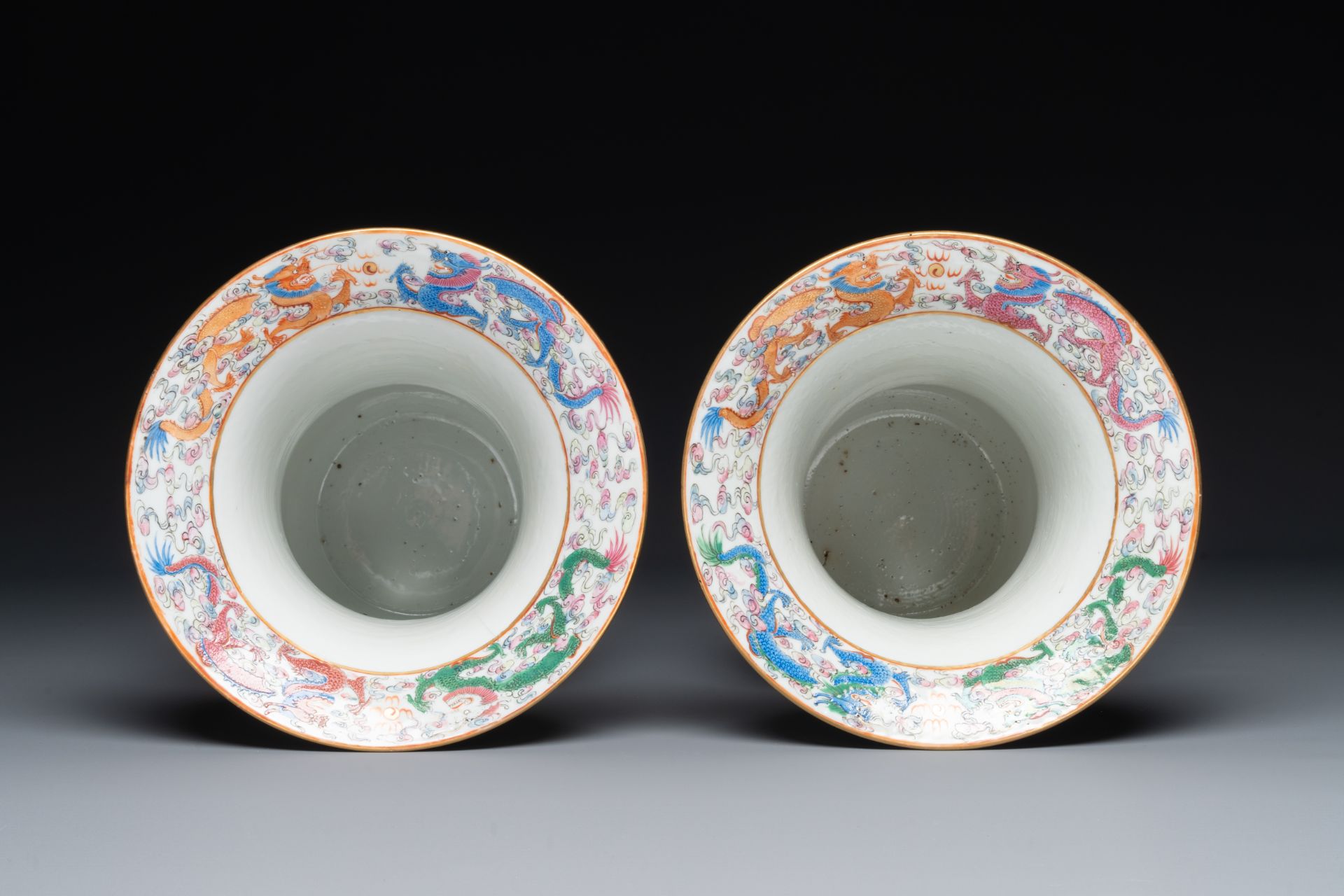 A pair of Chinese Canton famille rose spittoons with dragons, birds, butterflies and flowers, 19th C - Image 5 of 6