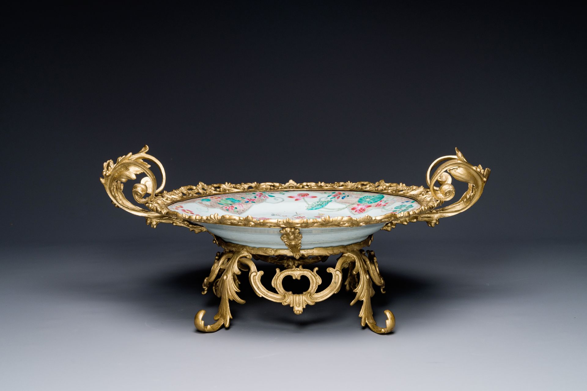 A Chinese famille rose 'flower basket' dish with gilt bronze mount, Yongzheng - Image 3 of 4