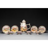 Four Chinese famille rose cups and saucers and an ewer with design of two horses, Qianlong