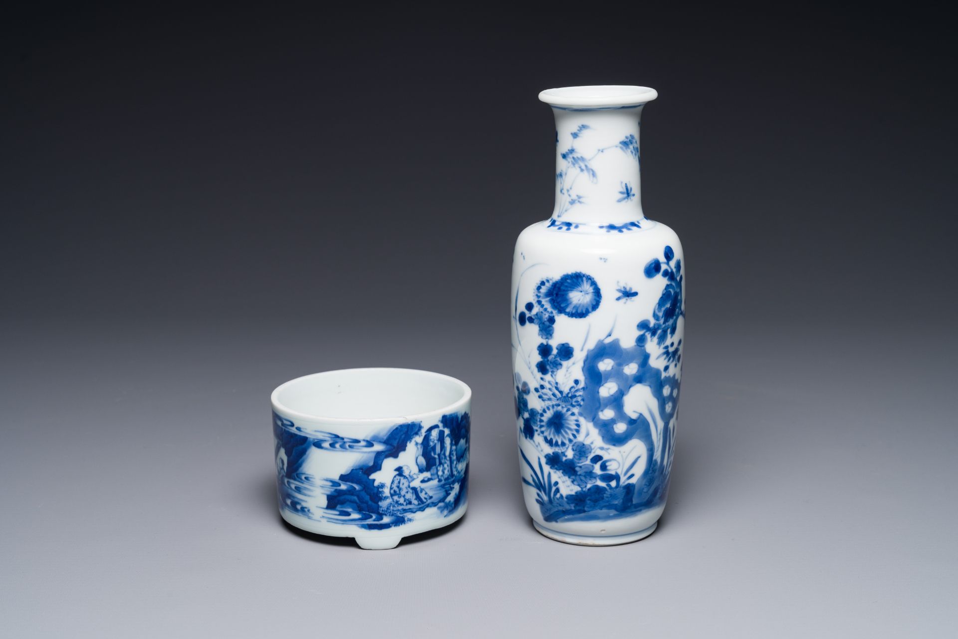 A Chinese blue and white rouleau vase and a tripod censer, Kangxi