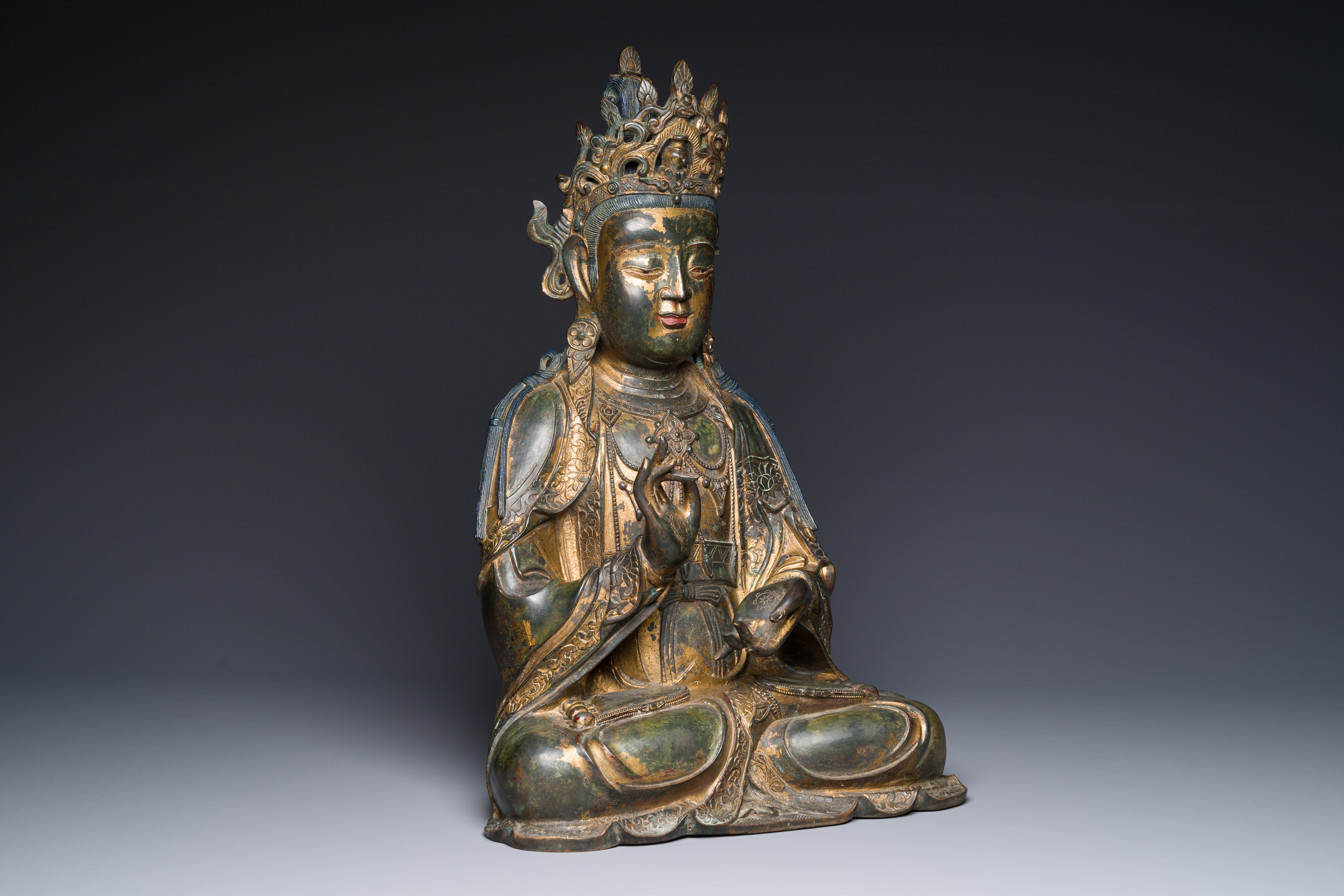 A large fine Chinese gilt-lacquered bronze sculpture of a Bodhisattva, Ming