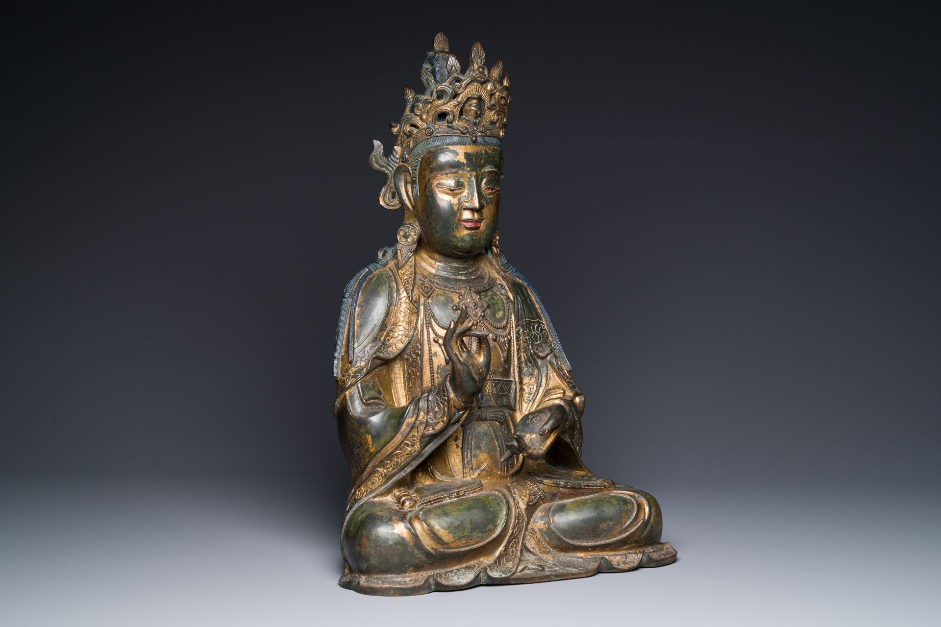 A large fine Chinese gilt-lacquered bronze sculpture of a Bodhisattva, Ming