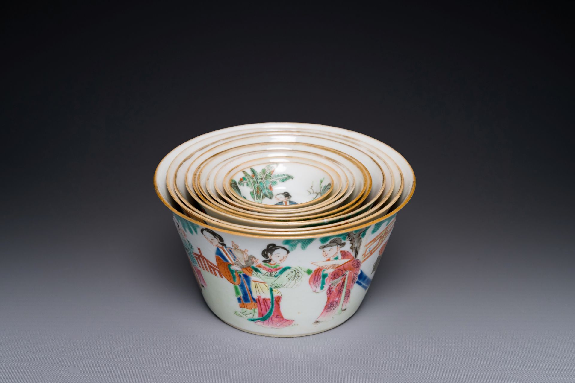A rare set of ten Chinese famille rose 'erotic' nesting bowls, Daoguang mark and of the period