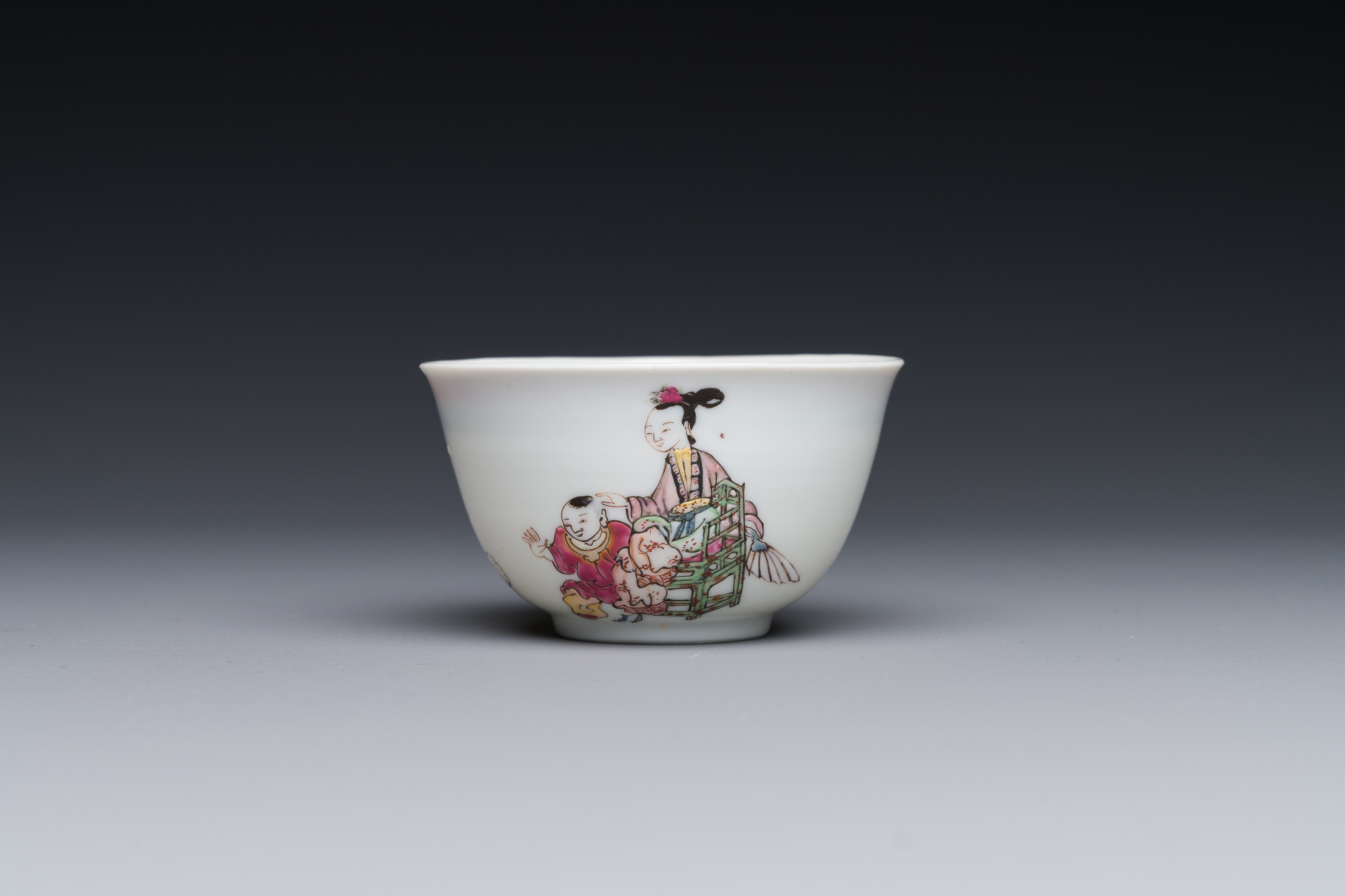 A Chinese famille rose cup and saucer with a court lady and a boy, Yongzheng - Image 4 of 6