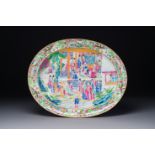 An ovale Chinese Canton famille rose dish with narrative design, 19th C.