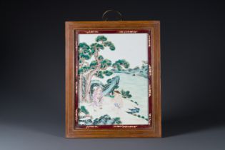 A Chinese famille rose 'two sages by the mountain' plaque in wooden frame, 18/19th C.