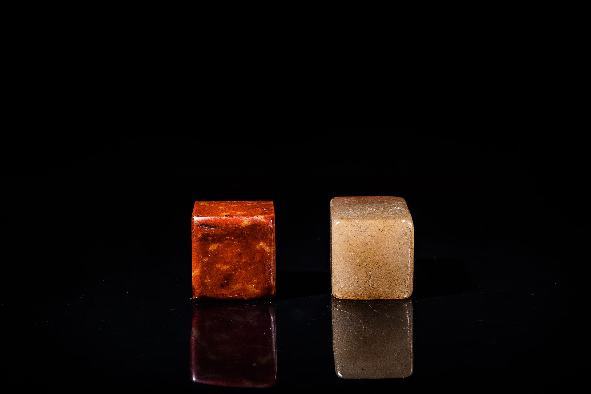 A Chinese 'chicken blood' soapstone seal and a russet jade seal, Qing - Image 5 of 6