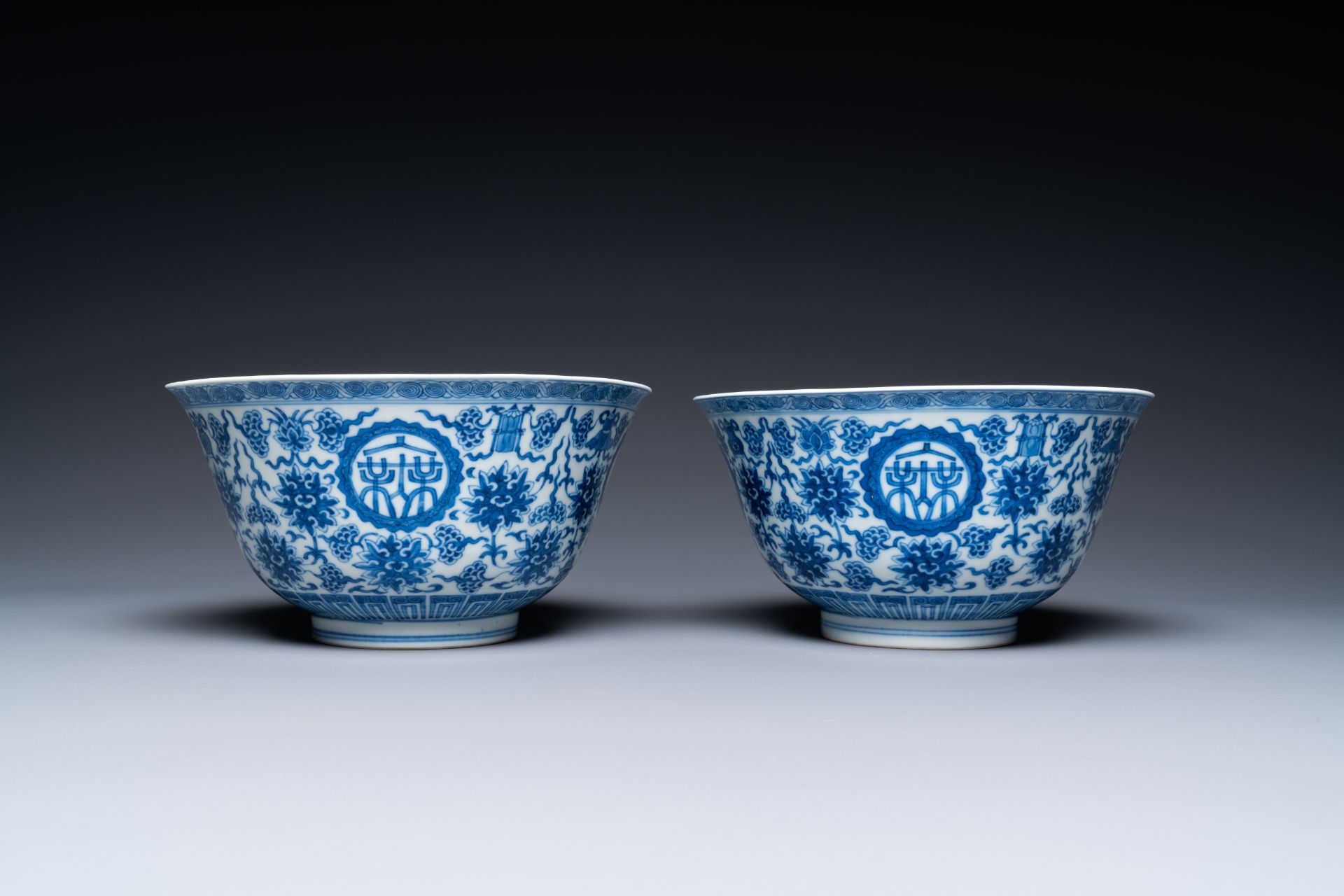 A pair of Chinese blue and white 'wan shou wu jiang' bowls, Qianlong mark and of the period - Bild 2 aus 40