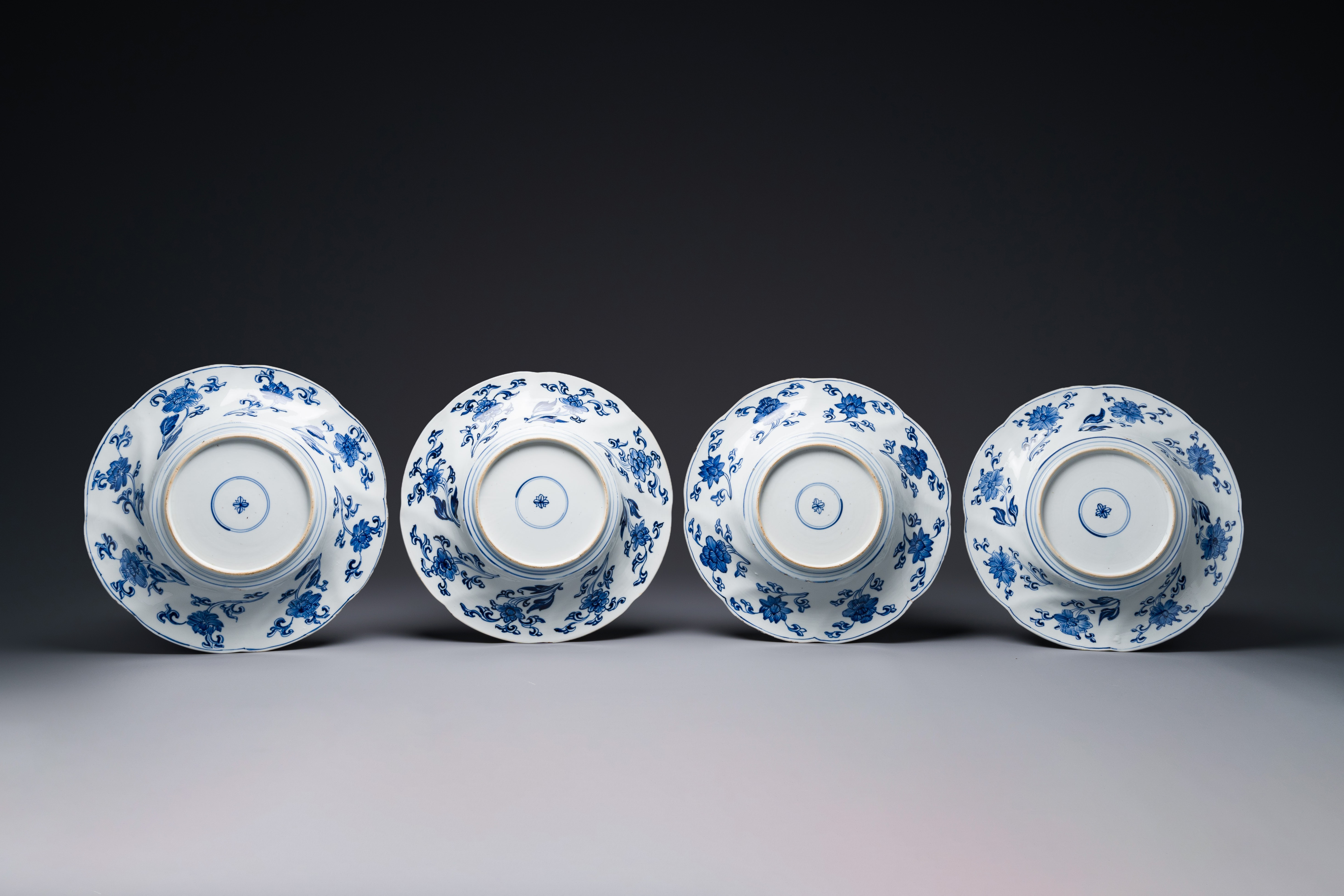 Four Chinese blue and white lobed 'phoenix and monkey' plates, flower mark, Kangxi - Image 5 of 5