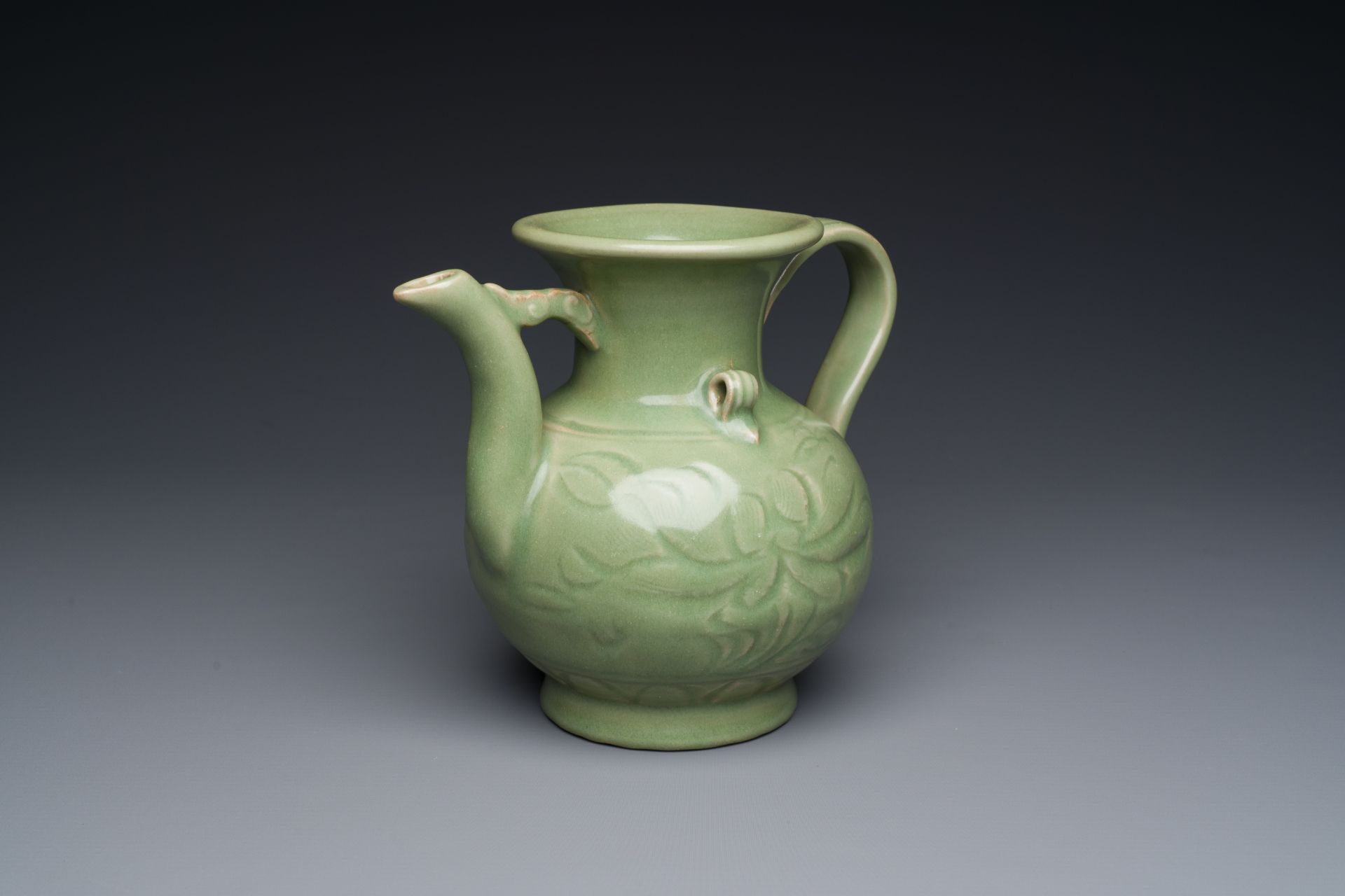 A Chinese Longquan celadon wine ewer with anhua design, Yuan/Ming