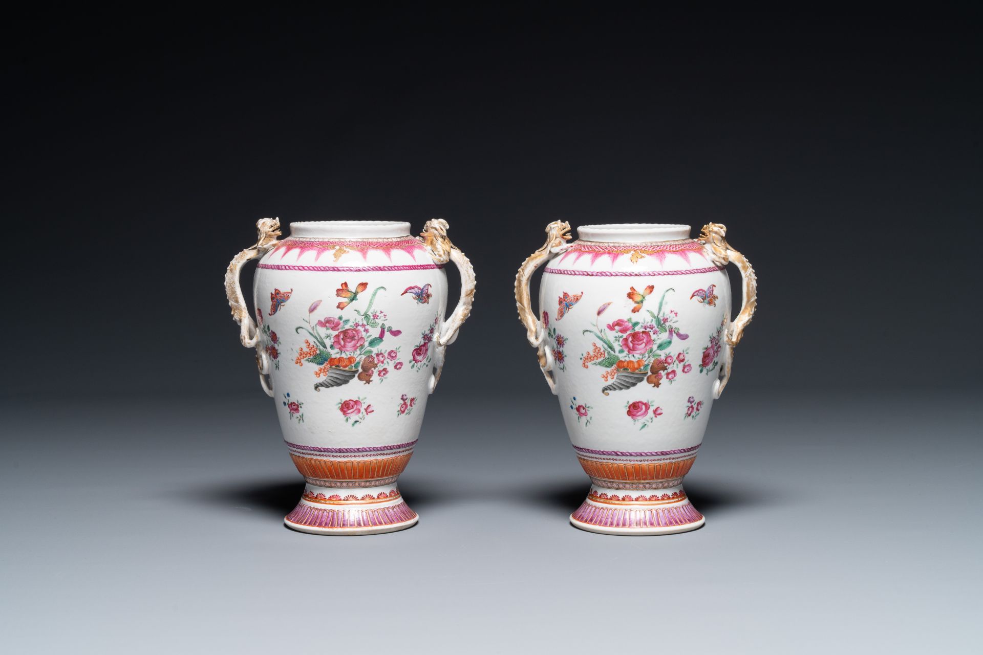 A pair of Chinese famille rose 'cornucopia' vases with chilong handles, Qianlong - Image 3 of 6