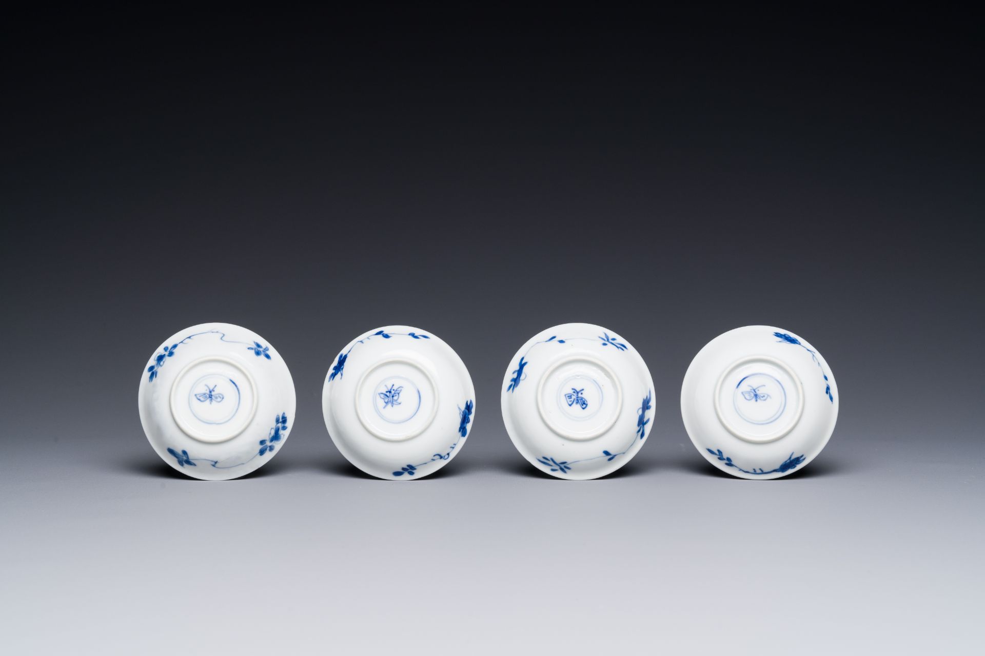 Four Chinese blue and white miniature cups and saucers, butterfly mark, Kangxi - Image 5 of 6