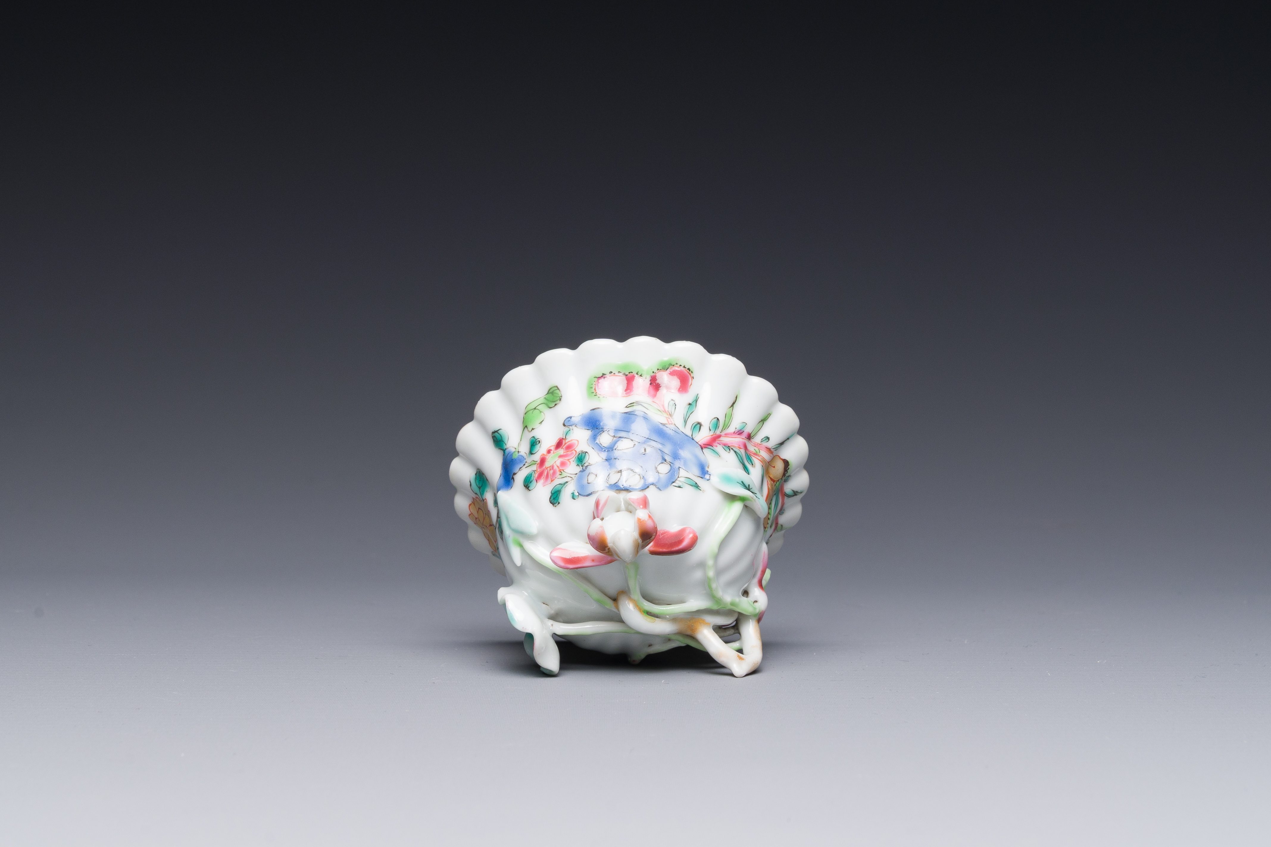 A Chinese famille rose relief-decorated cup and saucer, Yongzheng - Image 4 of 4