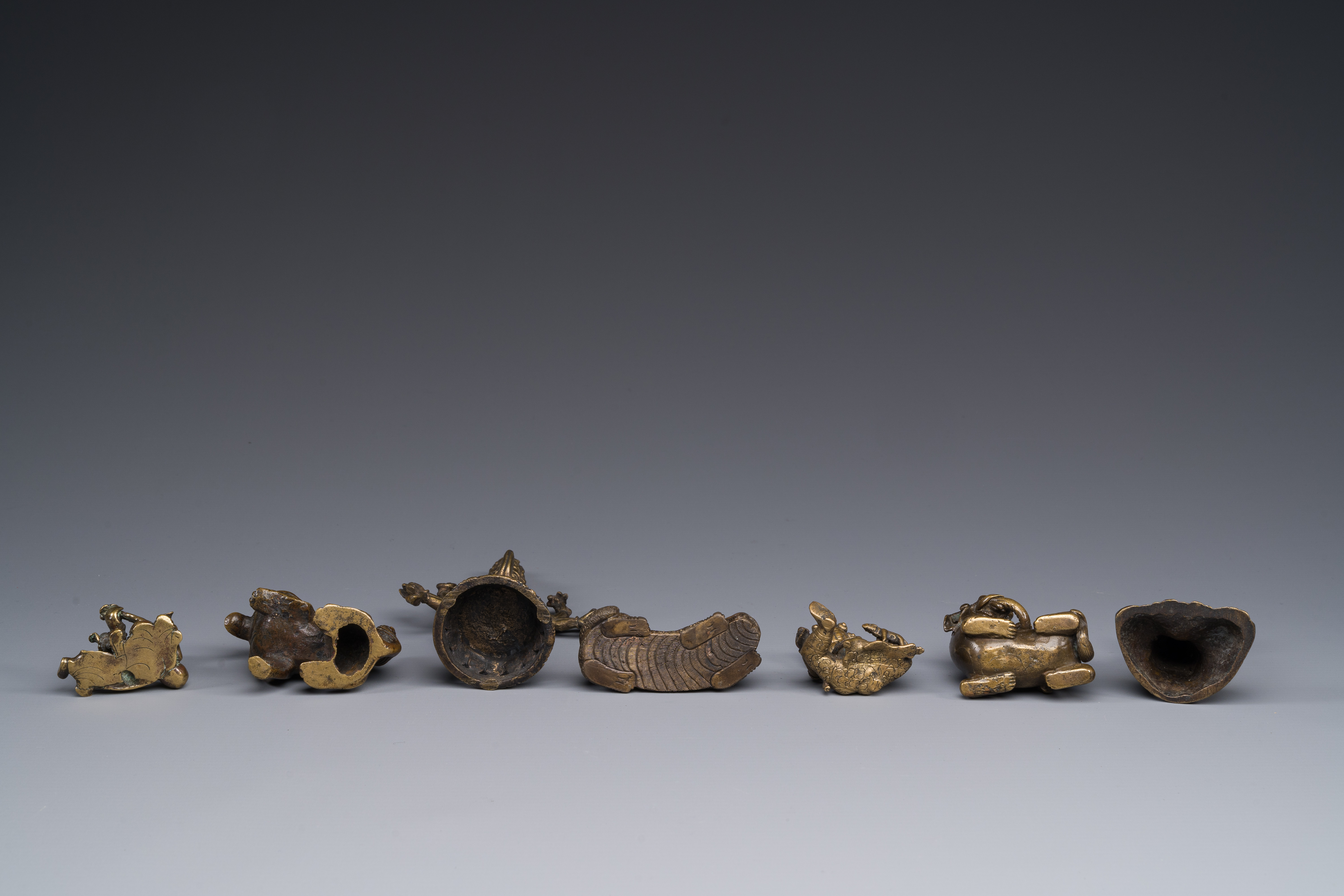 A collection of Chinese and Sino-tibetan bronze sculptures and paper weights, Qing - Image 4 of 4