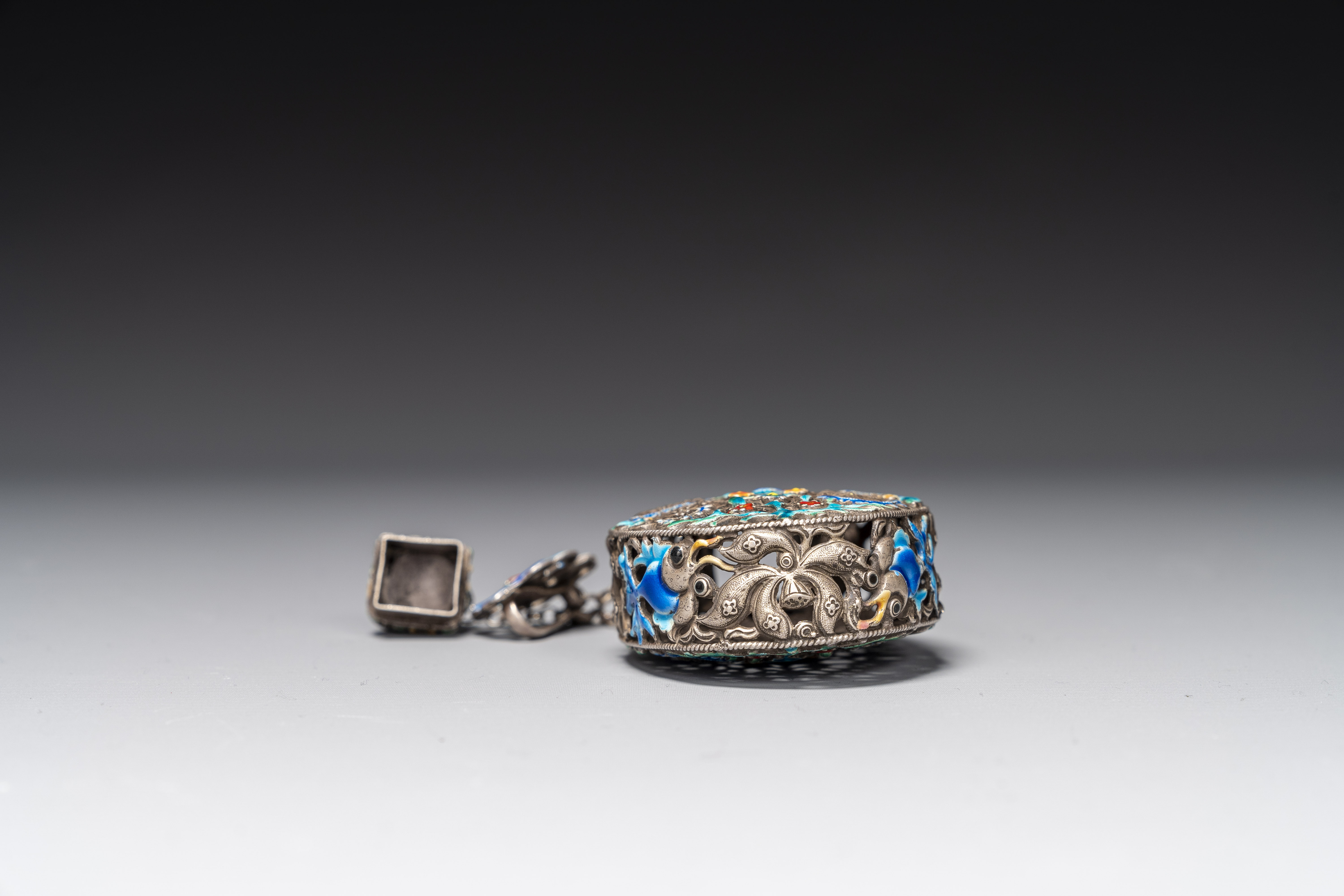 A Chinese openworked and partly enamelled silver bottle, 19th C. - Image 7 of 7