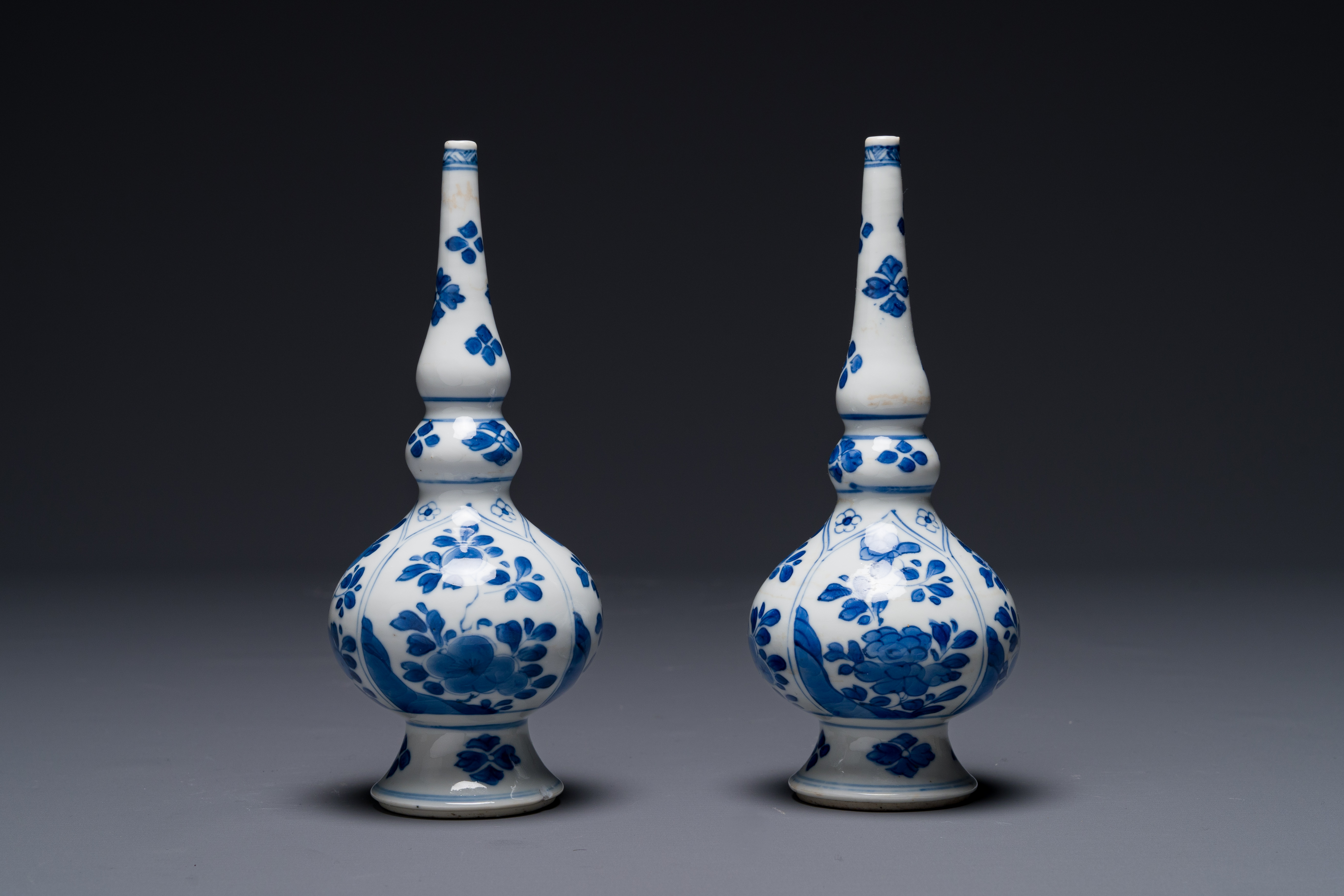 A pair of Chinese blue and white rosewater sprinklers for the Islamic market, Kangxi