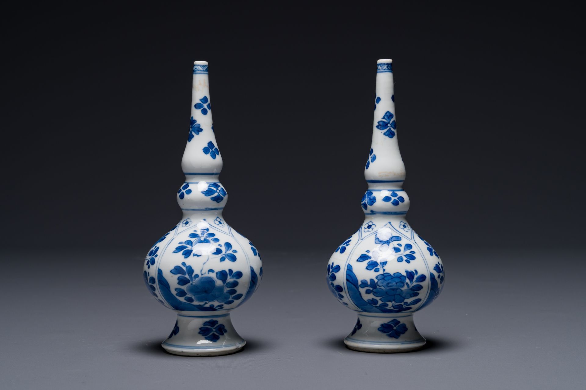 A pair of Chinese blue and white rosewater sprinklers for the Islamic market, Kangxi