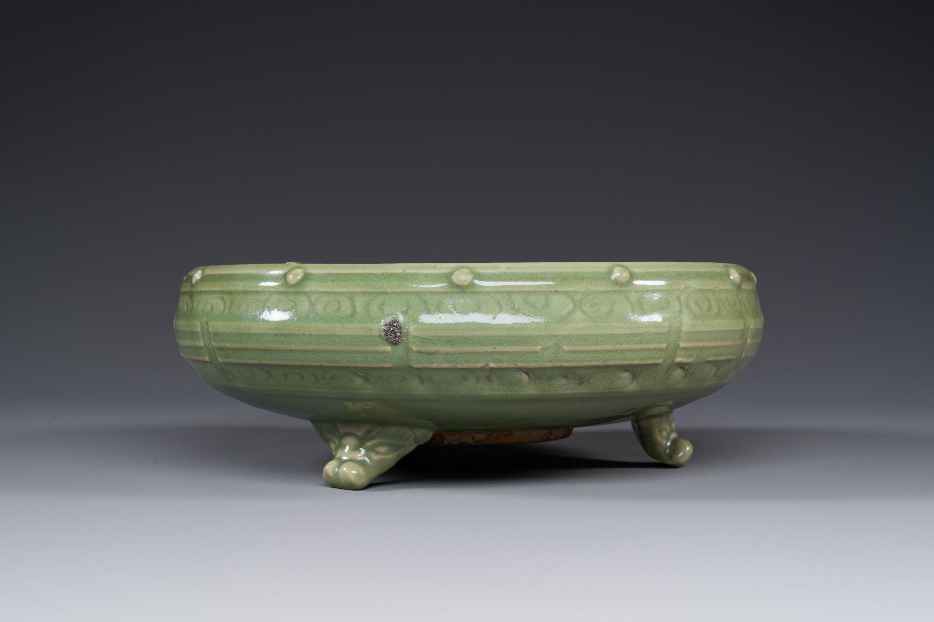 A Chinese Longquan celadon tripod censer on wooden stand, Yuan/Ming - Image 5 of 10
