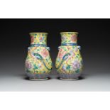 A pair of Chinese famille rose yellow-ground 'hu' vases for the Straits or Peranakan market, 19th C.