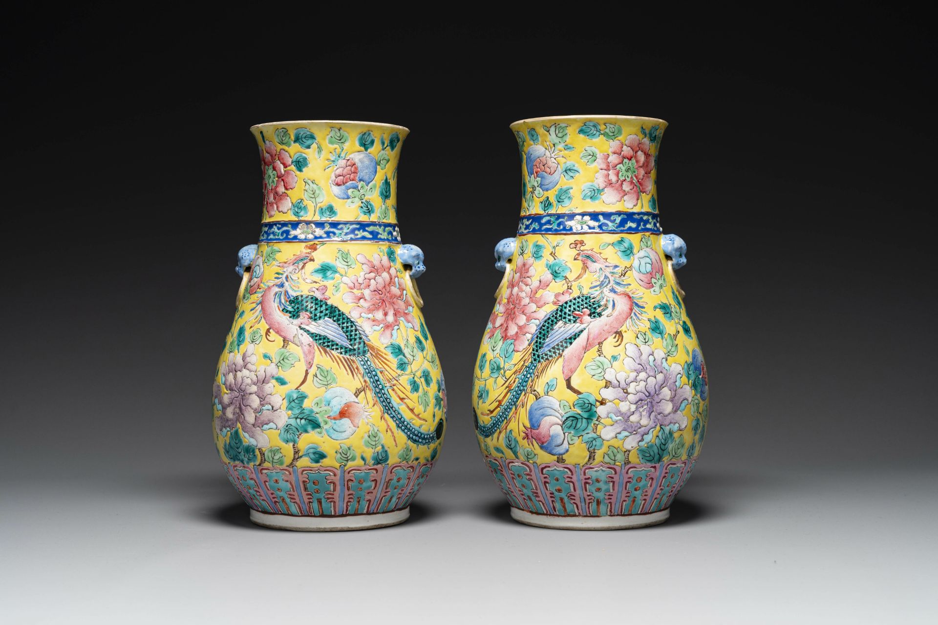 A pair of Chinese famille rose yellow-ground 'hu' vases for the Straits or Peranakan market, 19th C.