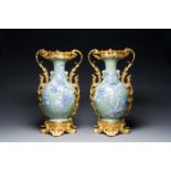 A pair of Chinese blue and white celadon vases with gilt bronze mounts, 19th C.