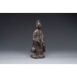 A Chinese bronze figure of a standing Guanyin, Ming