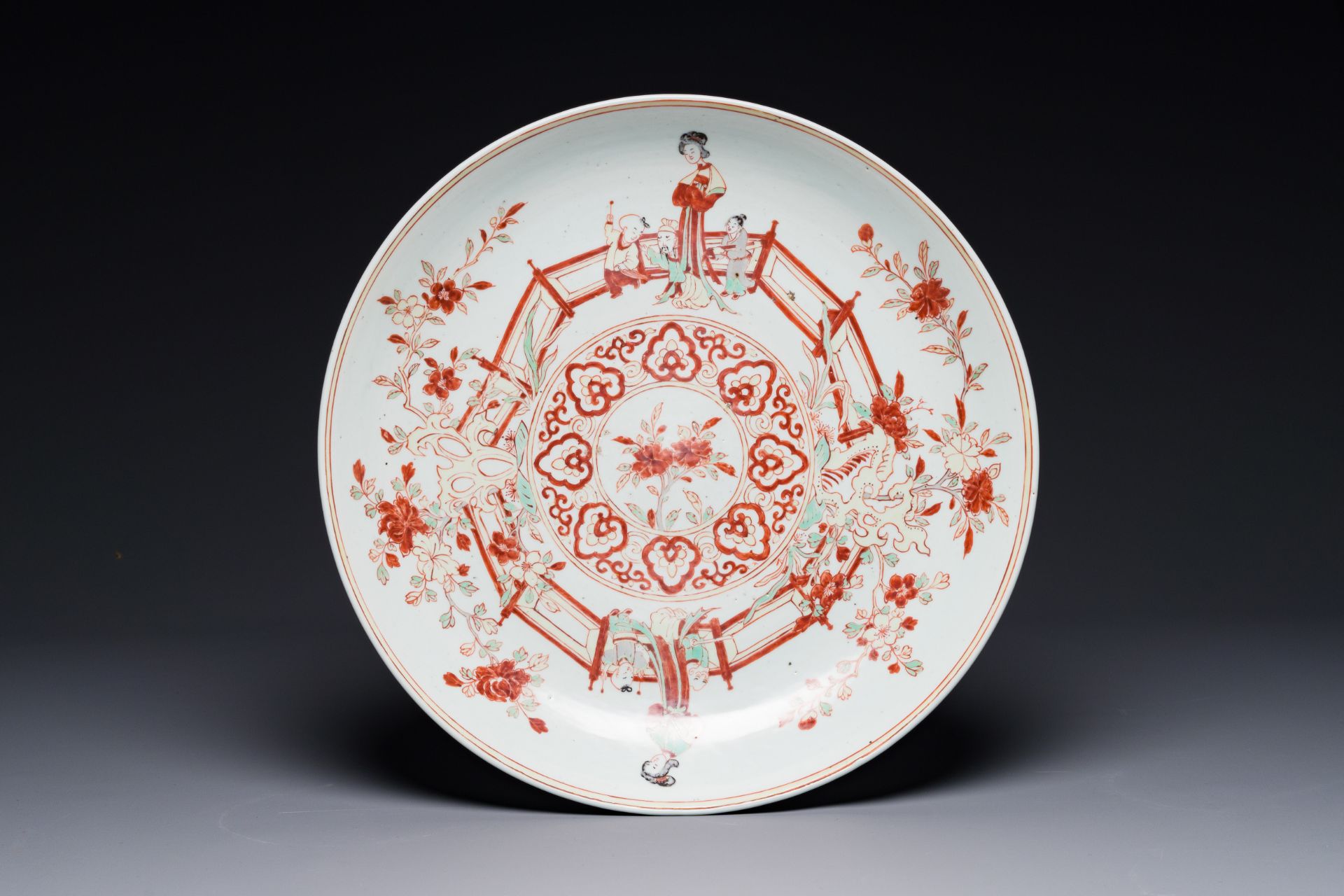 A Chinese wucai dish with figural and floral design, Jiajing mark, Transitional period