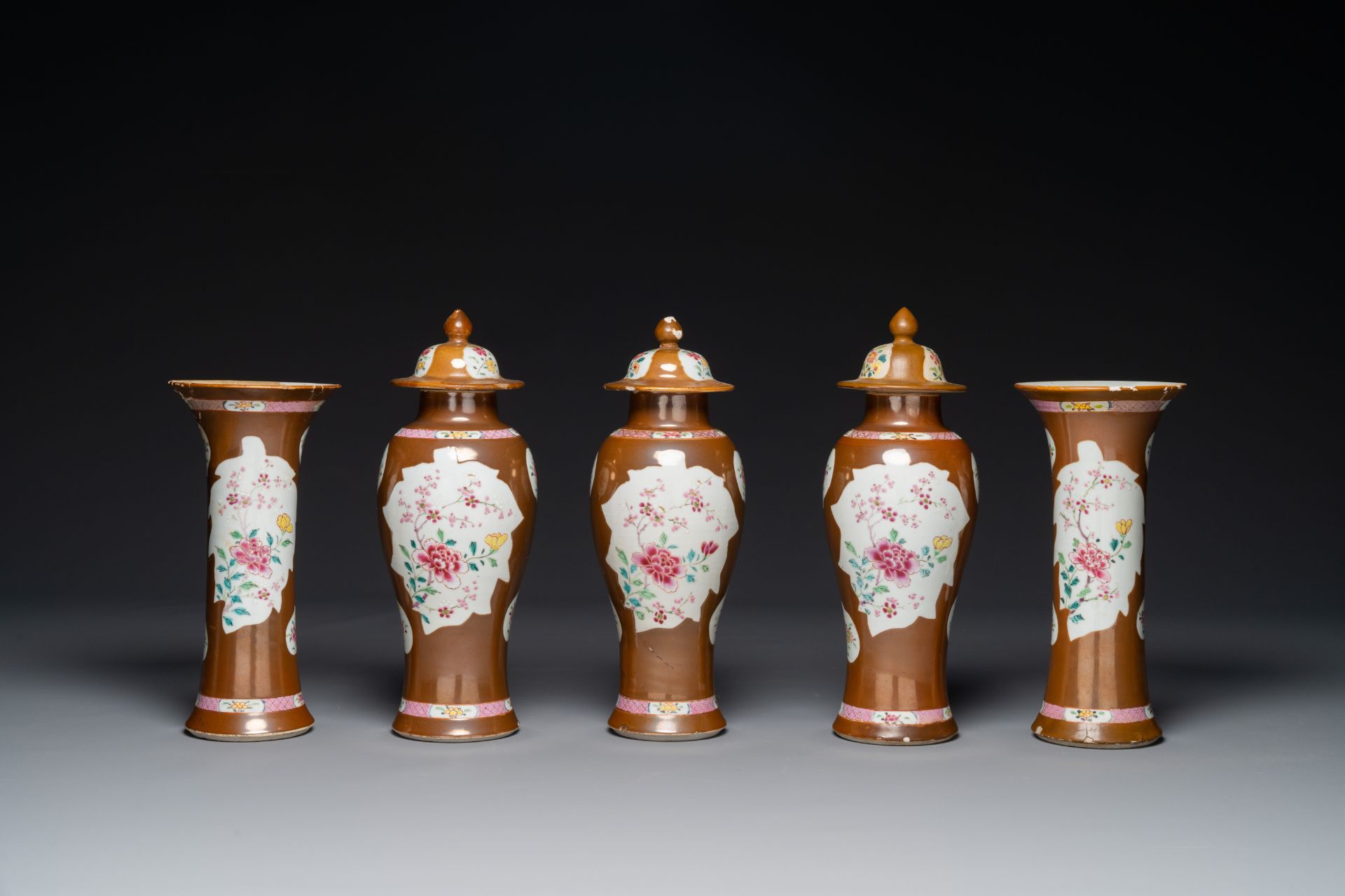 A Chinese capucin-brown-ground famille rose garniture of five vases with floral design, Qianlong - Image 3 of 7