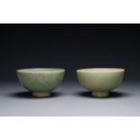 Two rare Chinese Longquan celadon bowls with figural design, Yuan