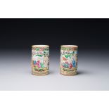 A pair of Chinese reticulated Canton famille rose brush pots, 19th C.