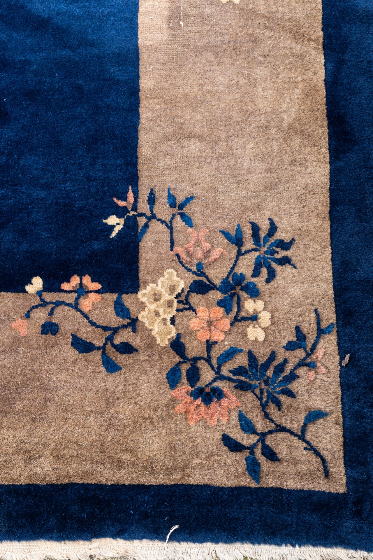 A large Chinese dark-blue-ground carpet with floral design, 19/20th century - Image 2 of 7