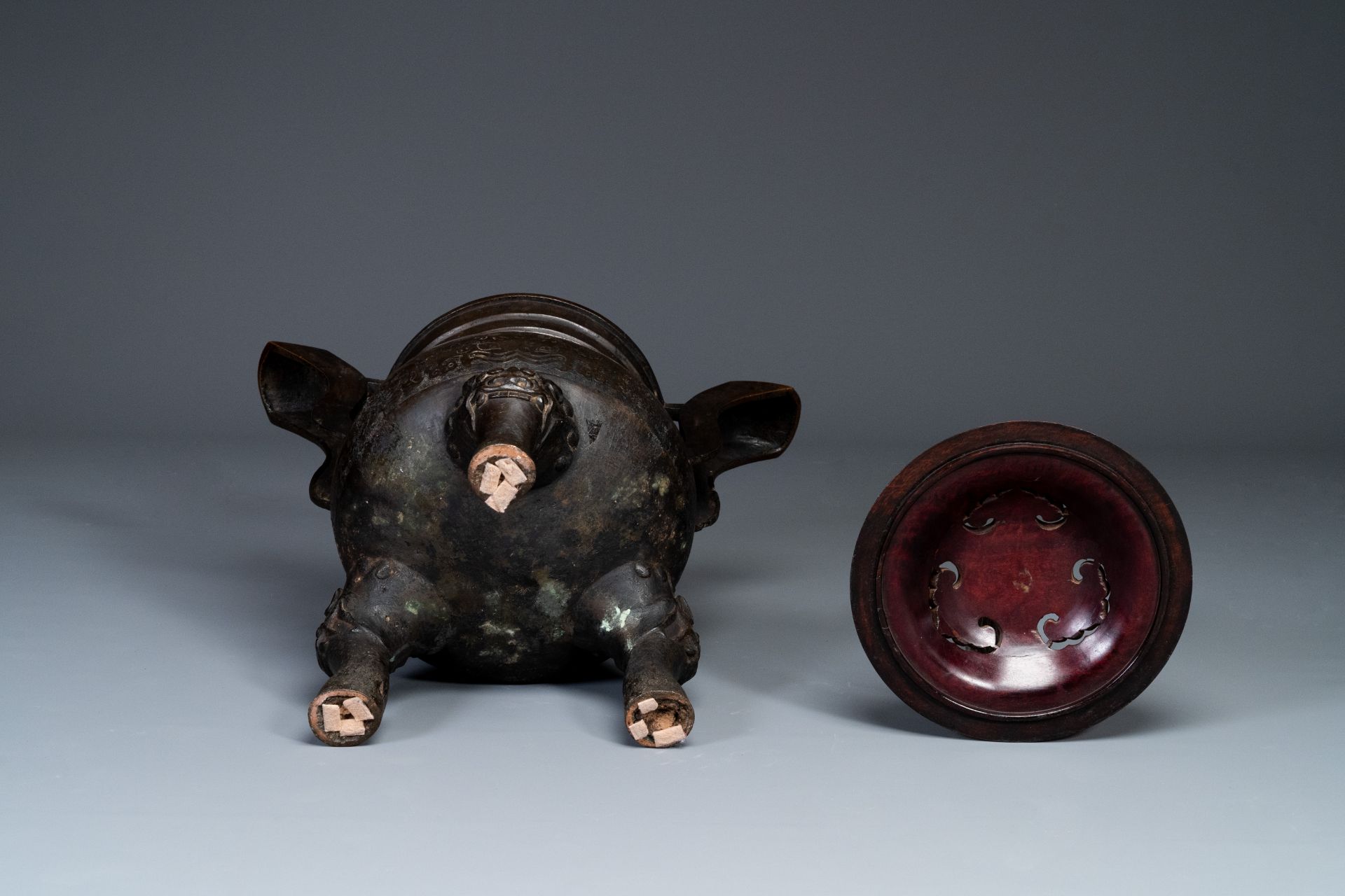 An important Chinese bronze tripod 'taotie' censer with wooden lid, Ming - Image 18 of 18