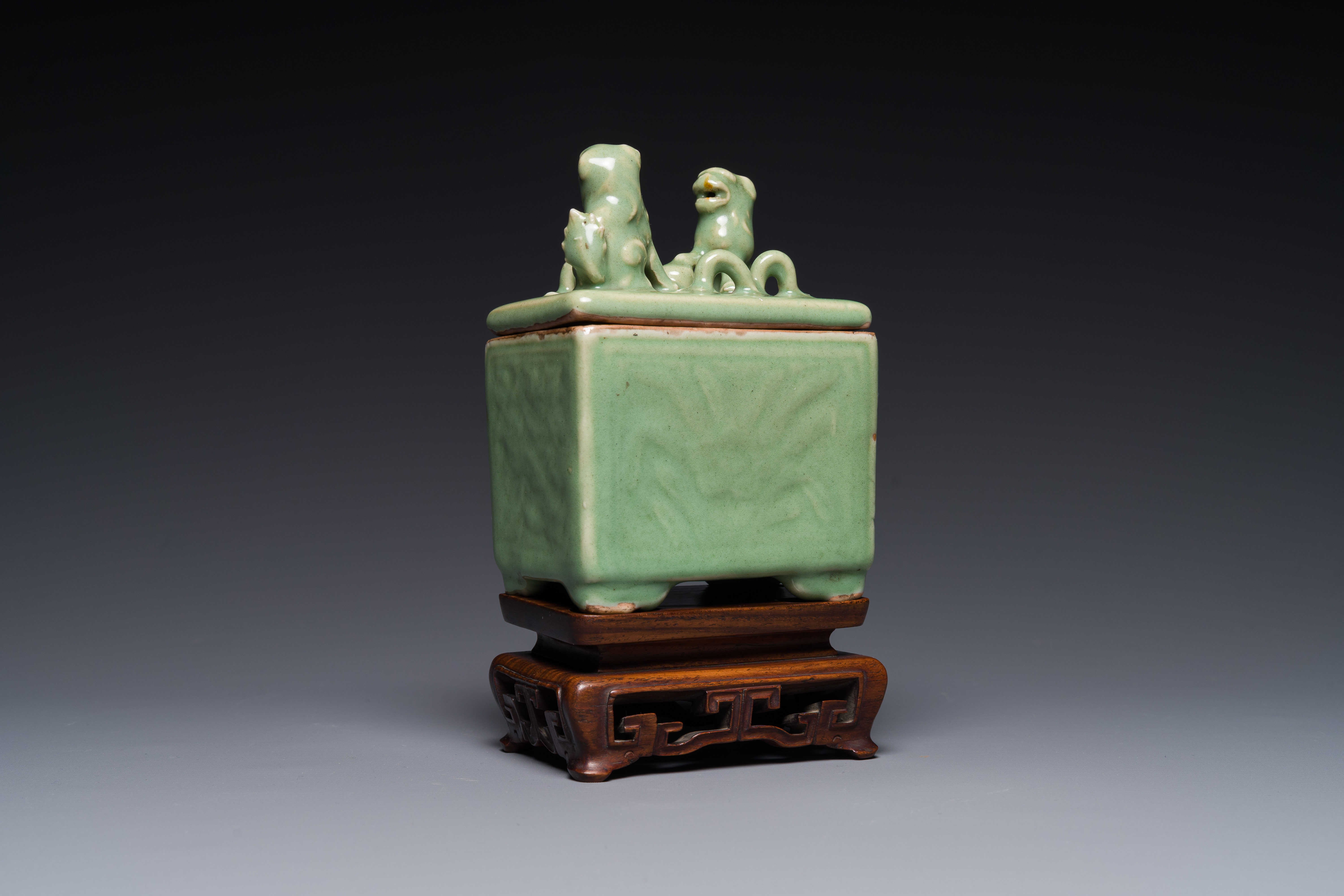 A Chinese Longquan celadon rectangular censer and cover on wooden stand, Ming - Image 2 of 5