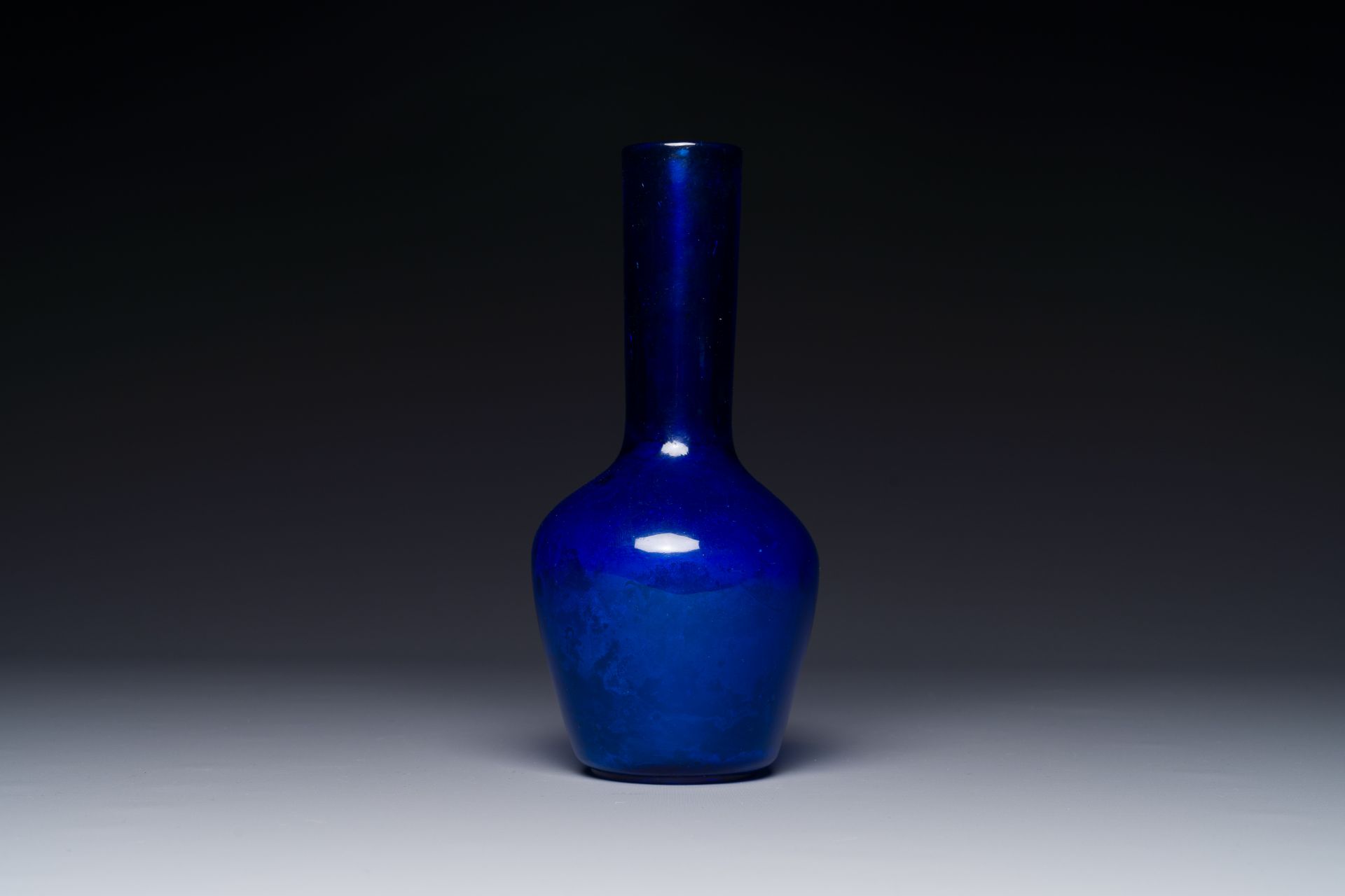 A Chinese blue Peking glass bottle vase, Qianlong mark and possibly of the period