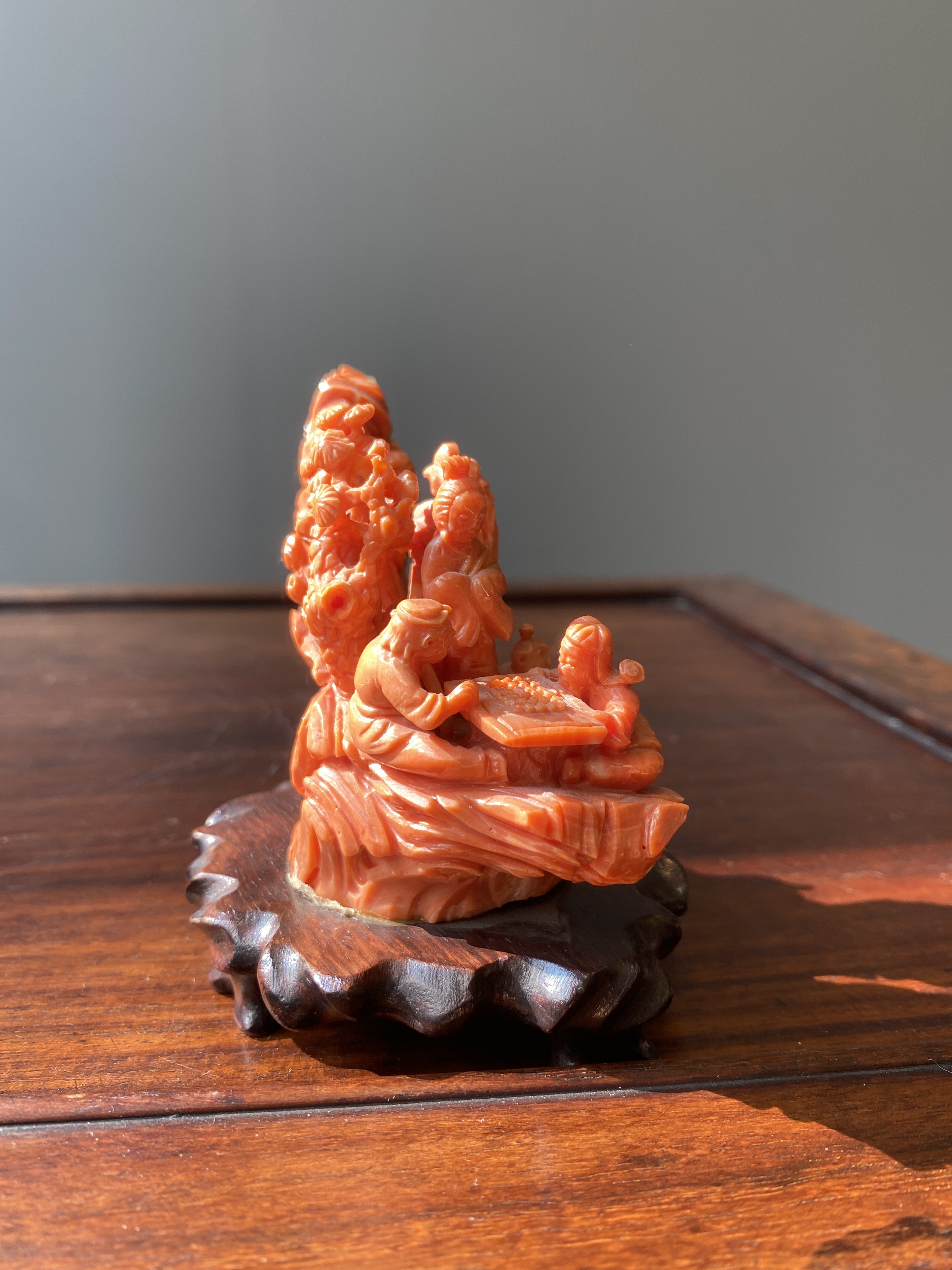 A Chinese red coral 'Eight Immortals' group on wooden stand, 19/20th C. - Image 10 of 14