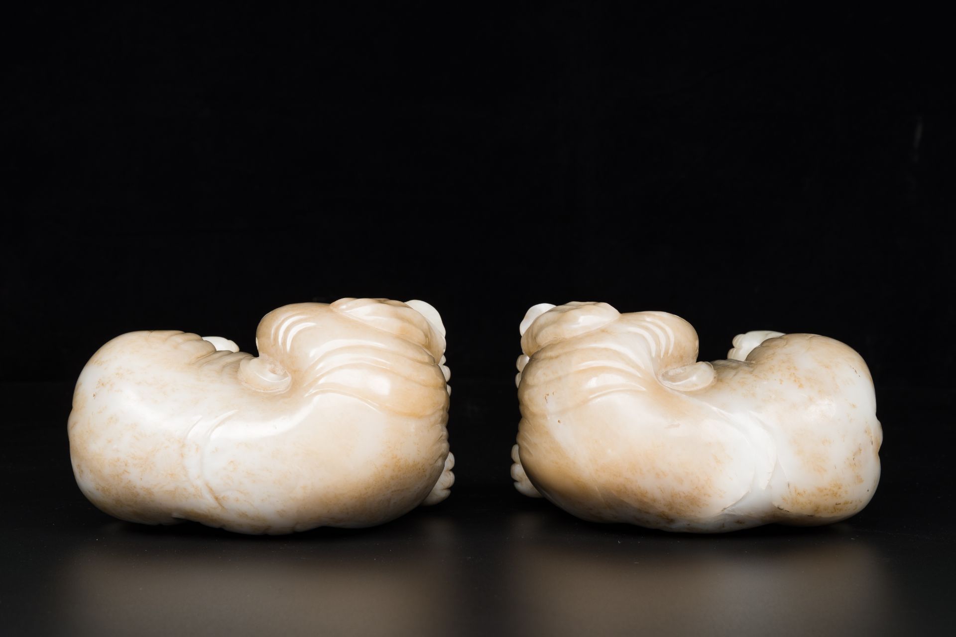 A pair of Chinese white and russet jade sculptures of elephants, Qianlong - Image 8 of 9