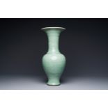 A Chinese Longquan celadon baluster vase with anhua floral design, Ming