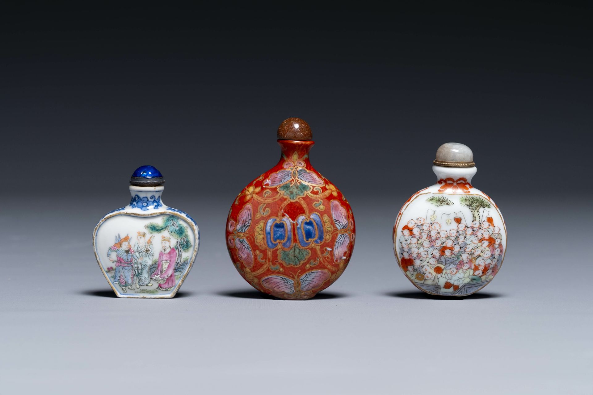 Three Chinese famille rose snuff bottles, Qianlong mark, 19th C.