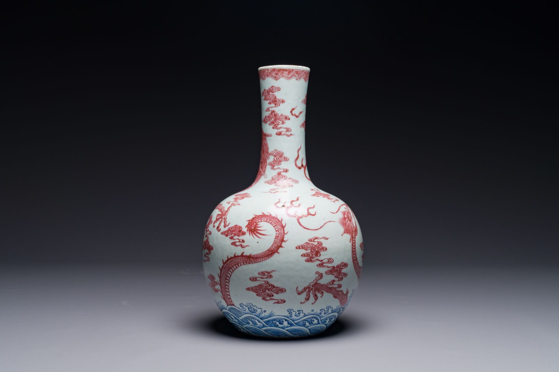 A Chinese blue, white and copper-red 'dragon' tianqiu ping' vase, 18th C. - Image 3 of 7