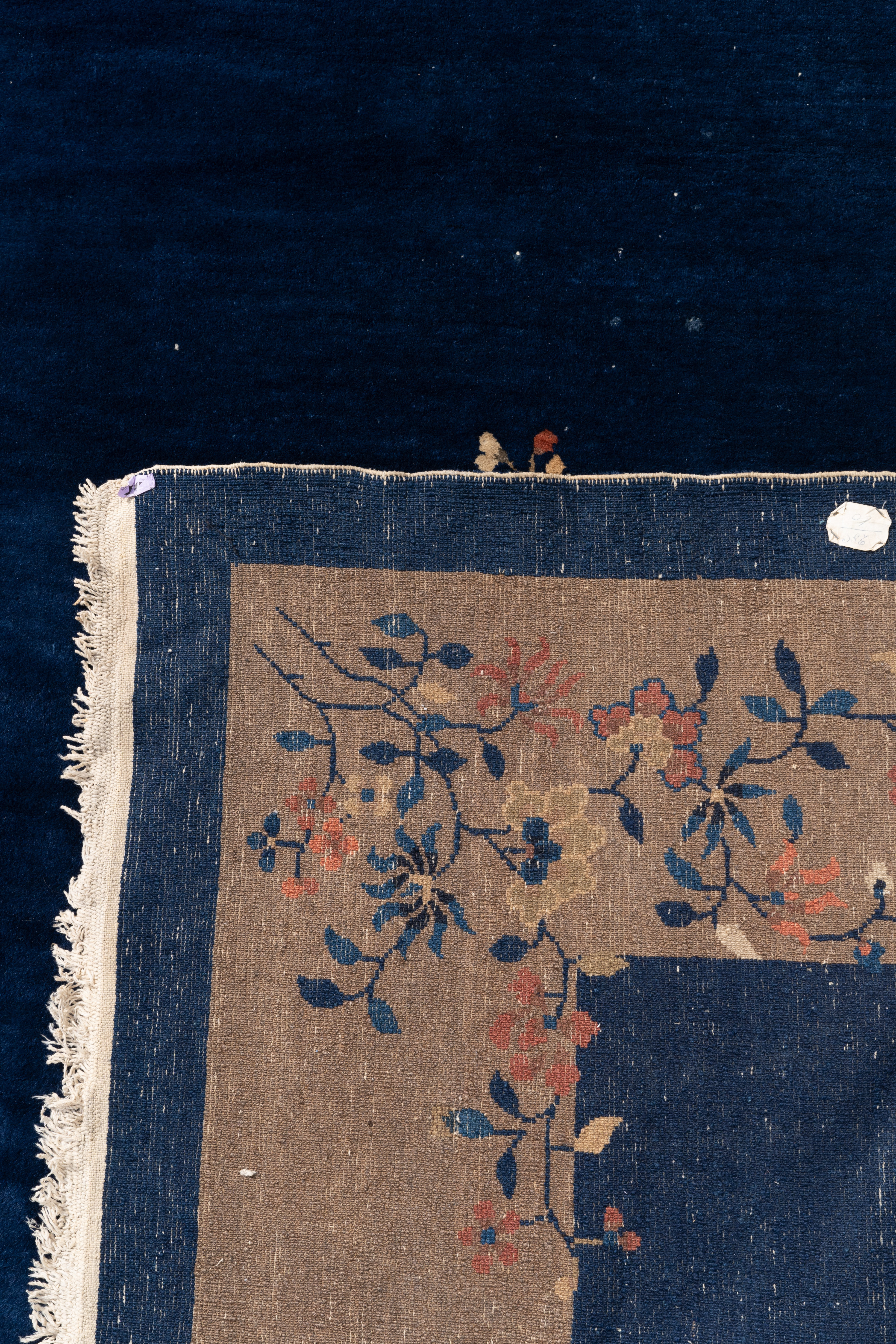 A large Chinese dark-blue-ground carpet with floral design, 19/20th century - Image 7 of 7