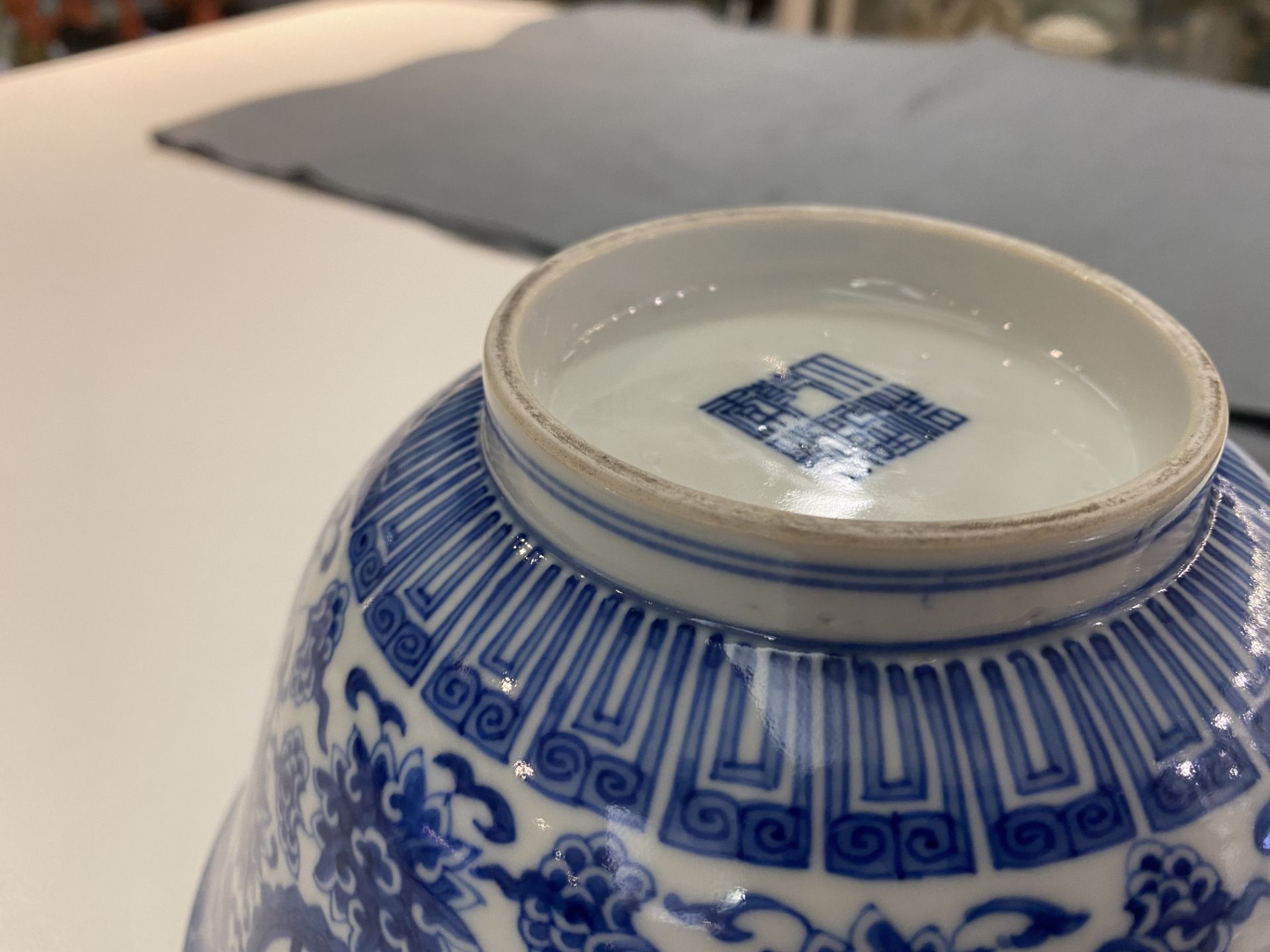 A pair of Chinese blue and white 'wan shou wu jiang' bowls, Qianlong mark and of the period - Bild 38 aus 40