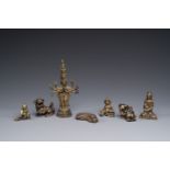 A collection of Chinese and Sino-tibetan bronze sculptures and paper weights, Qing