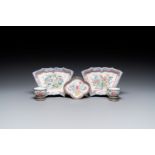 A pair of fine Chinese Canton enamel cups and three saucers with floral design, Yongzheng/Qianlong