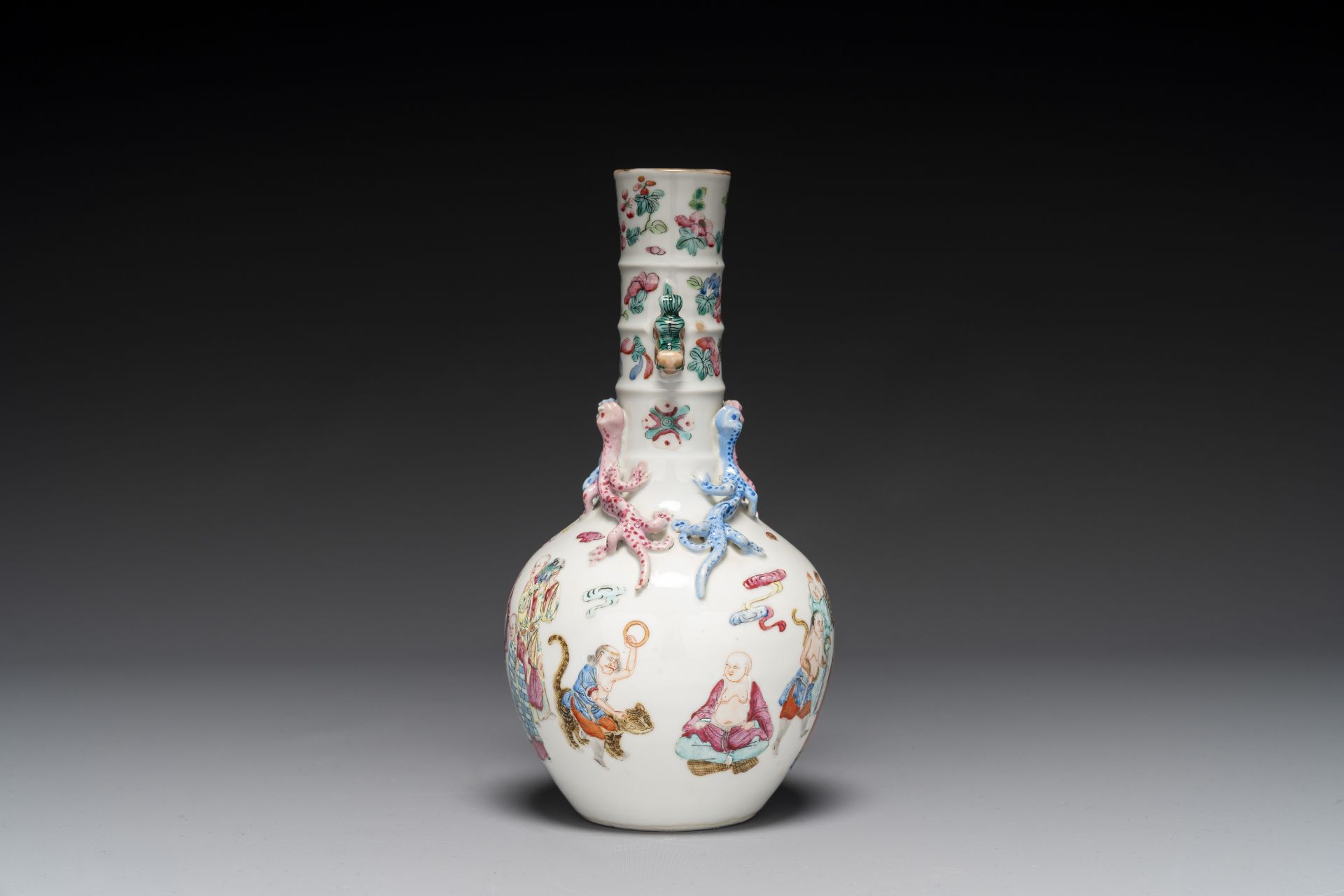 A Chinese famille rose '18 Luohan' bottle vase, 19th C. - Image 2 of 6